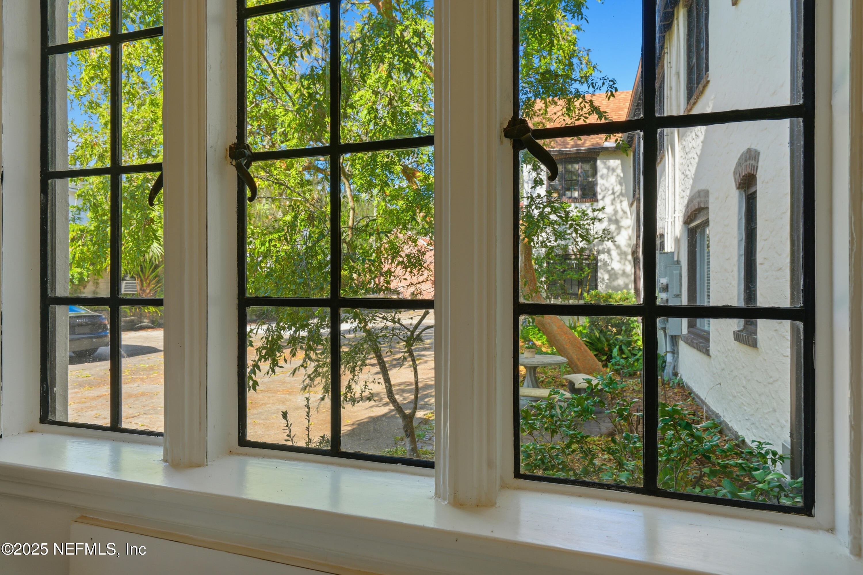 3319 Pine Street, Unit 7 Jacksonville, FL 32205 - Photo 17 of 37 a view of a glass door with a balcony