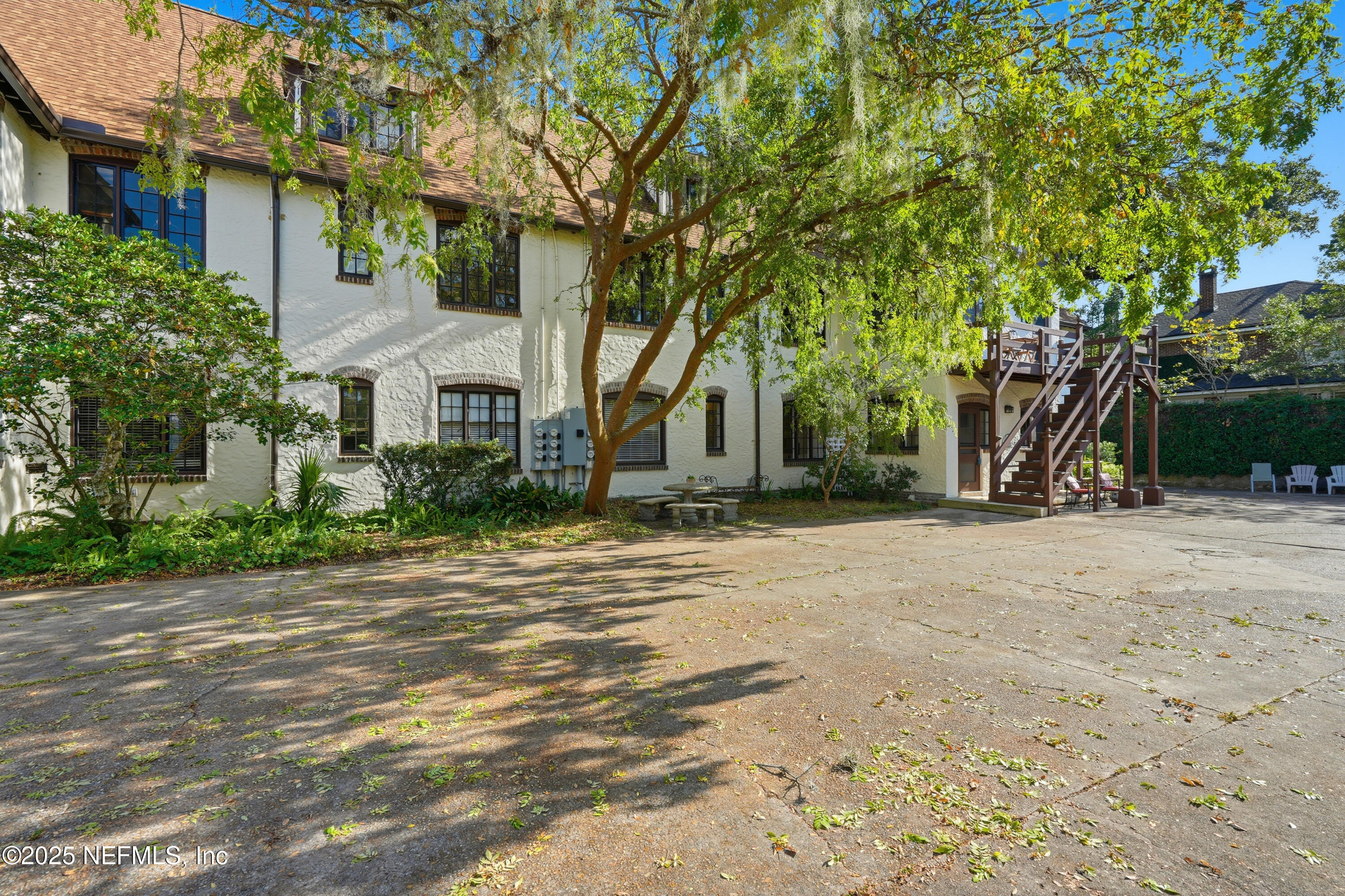 3319 Pine Street, Unit 7 Jacksonville, FL 32205 - Photo 19 of 37 a view of a house with a yard