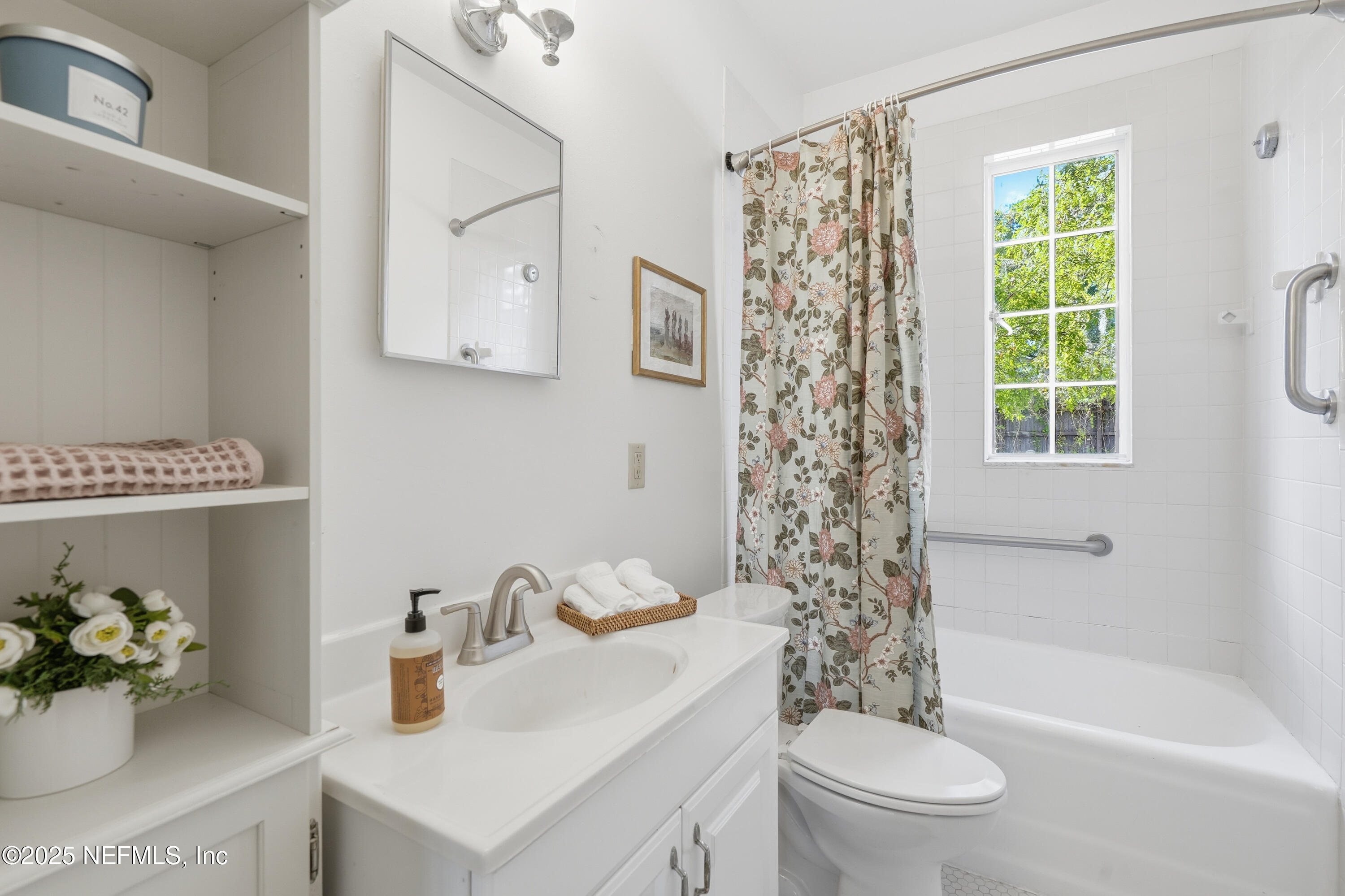 3319 Pine Street, Unit 7 Jacksonville, FL 32205 - Photo 25 of 37 a bathroom with a sink a toilet and a shower
