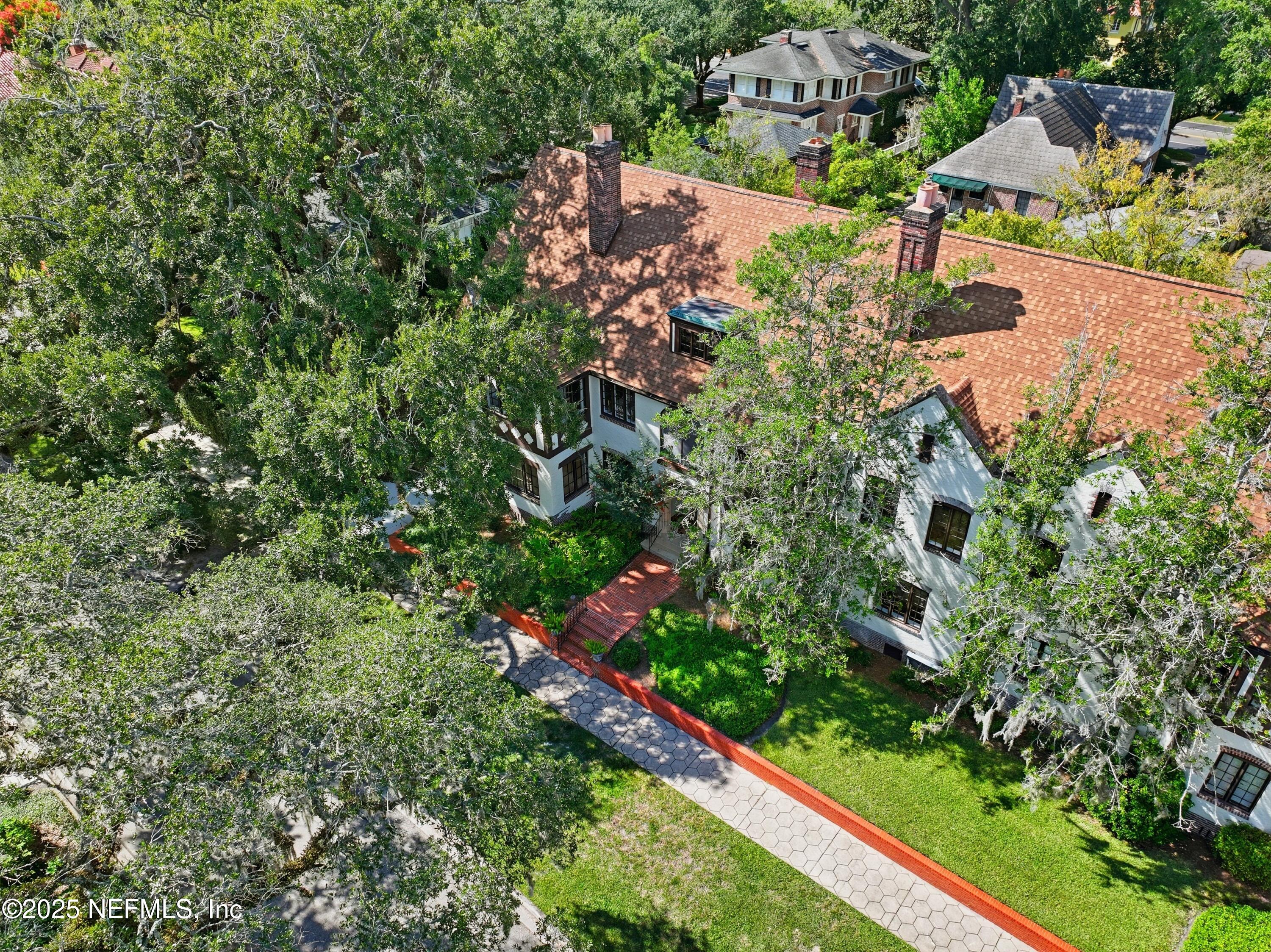 3319 Pine Street, Unit 7 Jacksonville, FL 32205 - Photo 28 of 37 an aerial view of residential house with outdoor space and trees all around