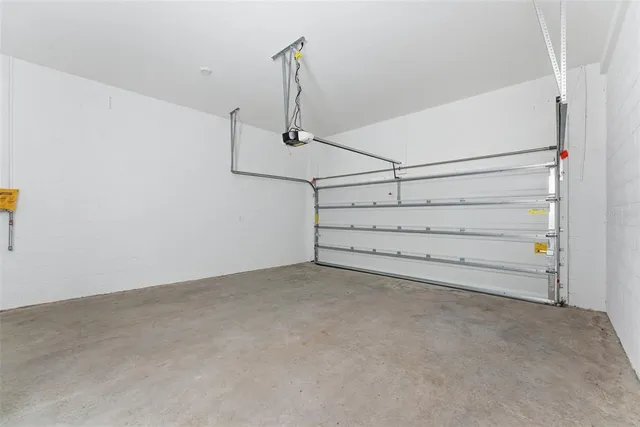 a view of room with window and hallway