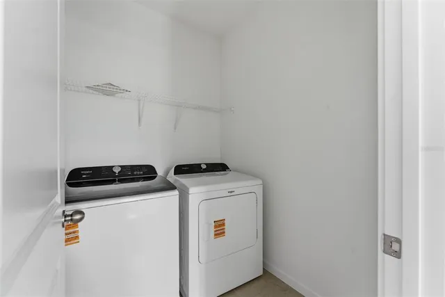 a view of a hallway with staircase