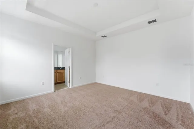 aerial view of a house with a big yard