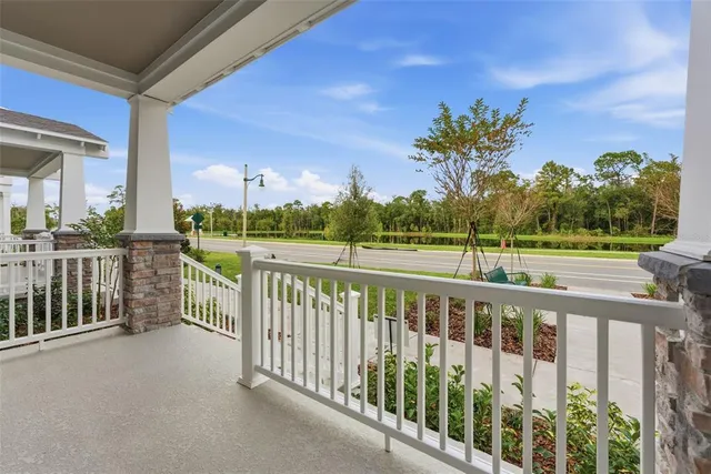 a front view of a house with a yard table and chairs