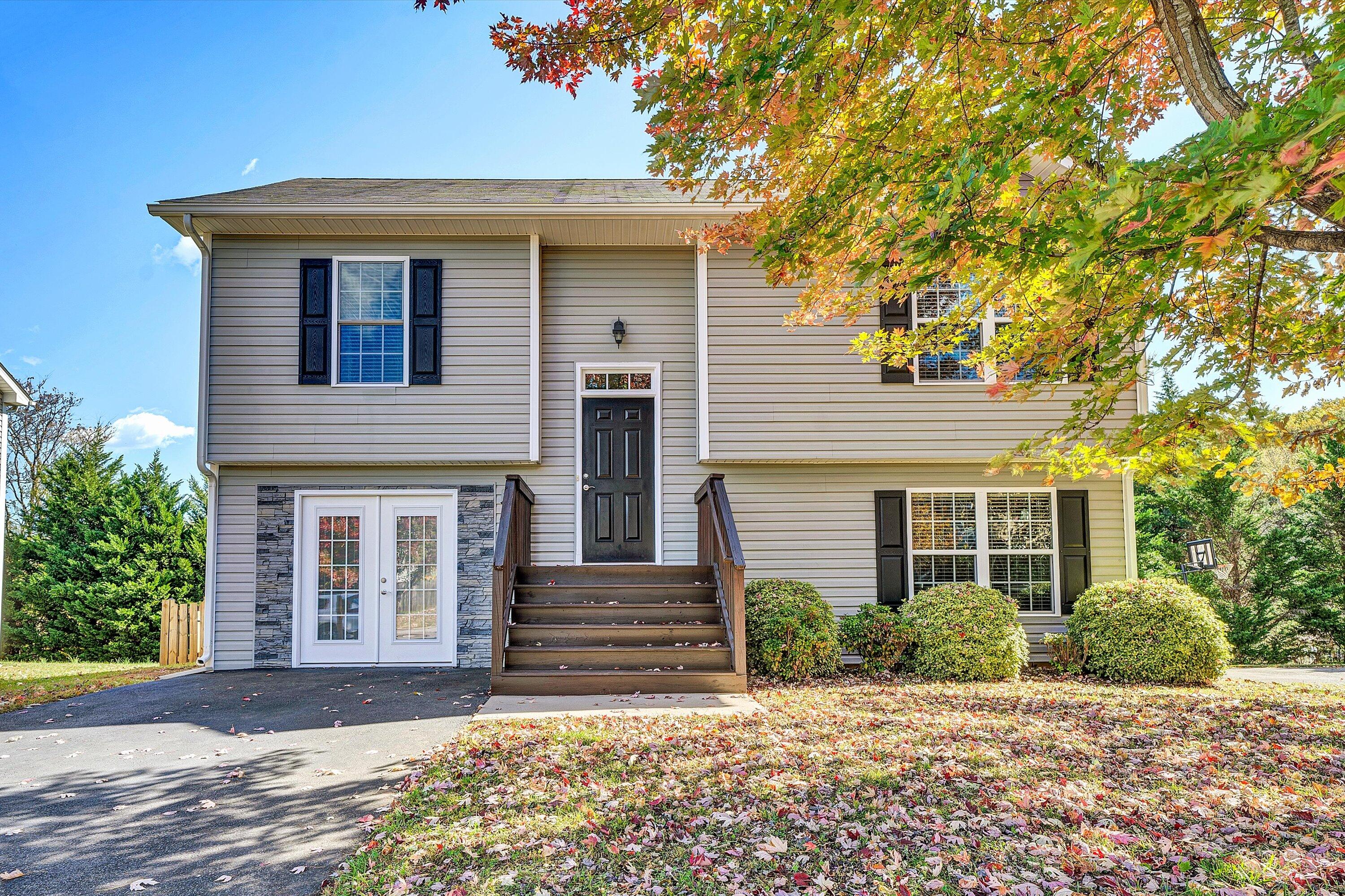 555 Old Fort Road Rocky Mount, VA 24151 - Photo 2 of 35 a front view of a house with a yard