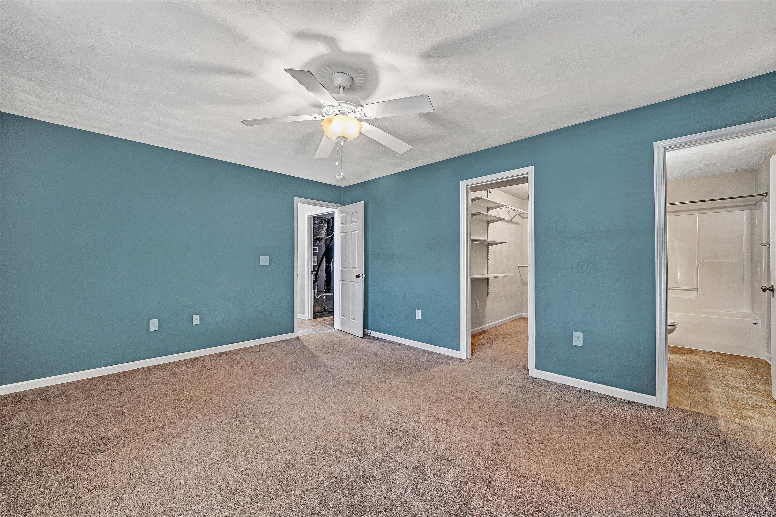 555 Old Fort Road Rocky Mount, VA 24151 - Photo 21 of 35 a view of an empty room with chandelier fan