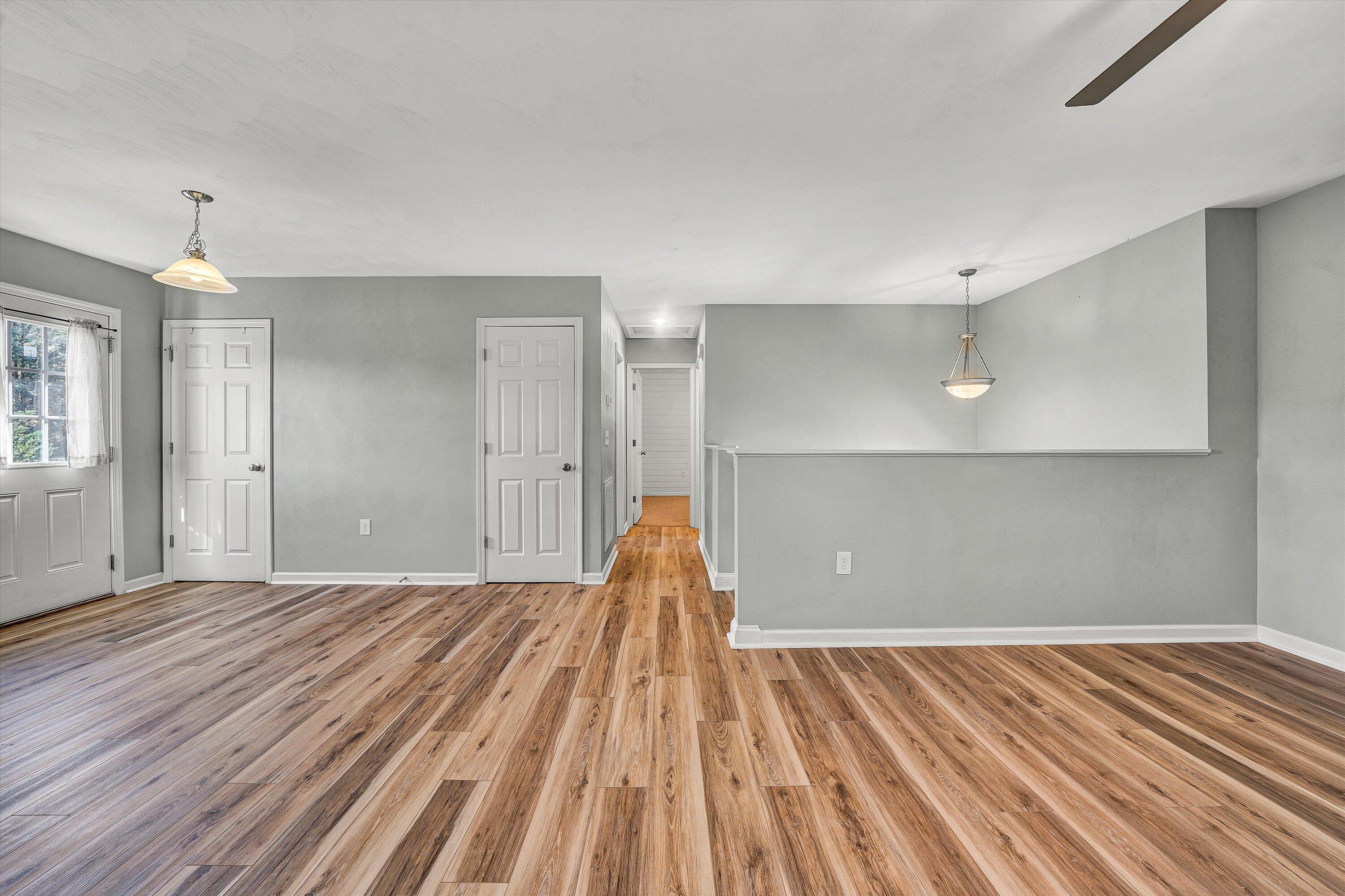 555 Old Fort Road Rocky Mount, VA 24151 - Photo 5 of 35 a view of a room with wooden floor and staircase