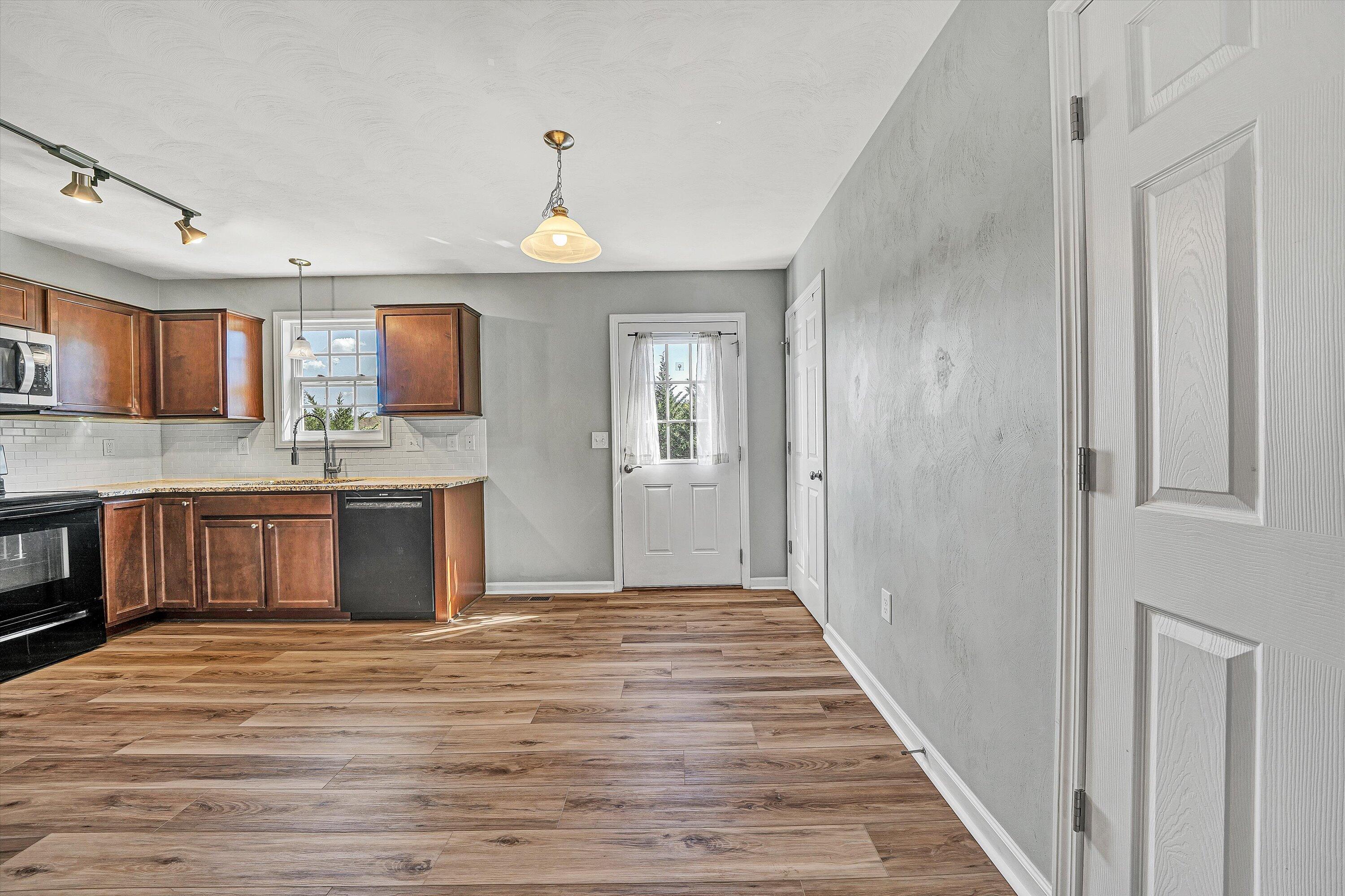 555 Old Fort Road Rocky Mount, VA 24151 - Photo 7 of 35 a view of kitchen with sink microwave and cabinets