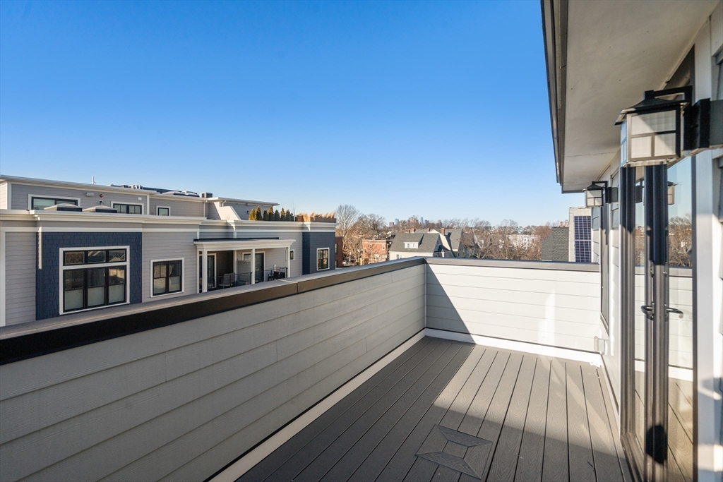 9 Sydney Street, Unit 4 Boston, MA 02125 - Photo 20 of 23 a view of a balcony with stainless steel appliances