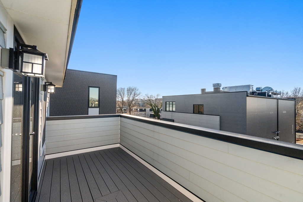 9 Sydney Street, Unit 4 Boston, MA 02125 - Photo 21 of 23 a view of a balcony with an outdoor space