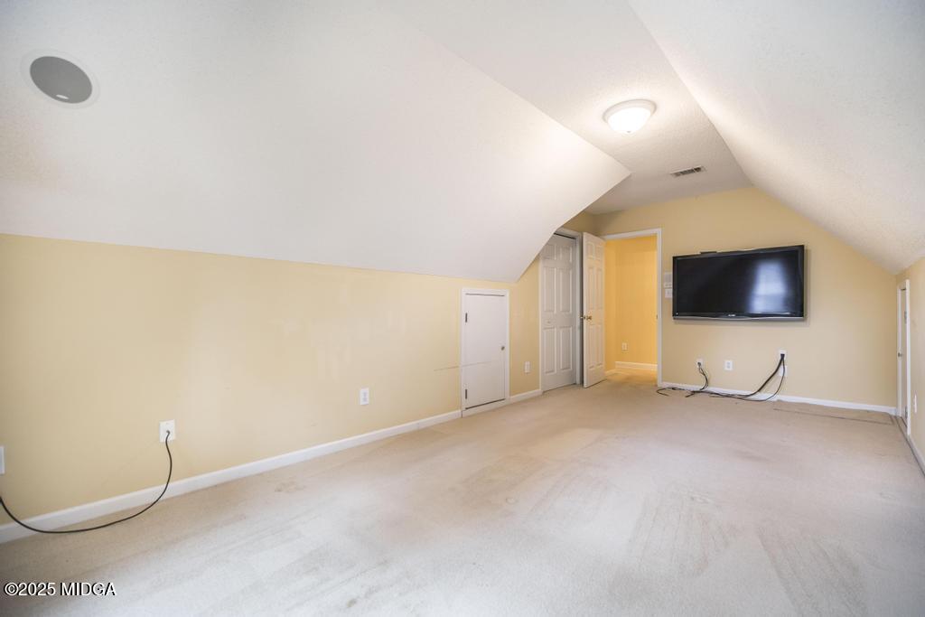 578 Edgefield Way Macon, GA 31210 - Photo 11 of 42 a view of an empty room with a flat screen tv