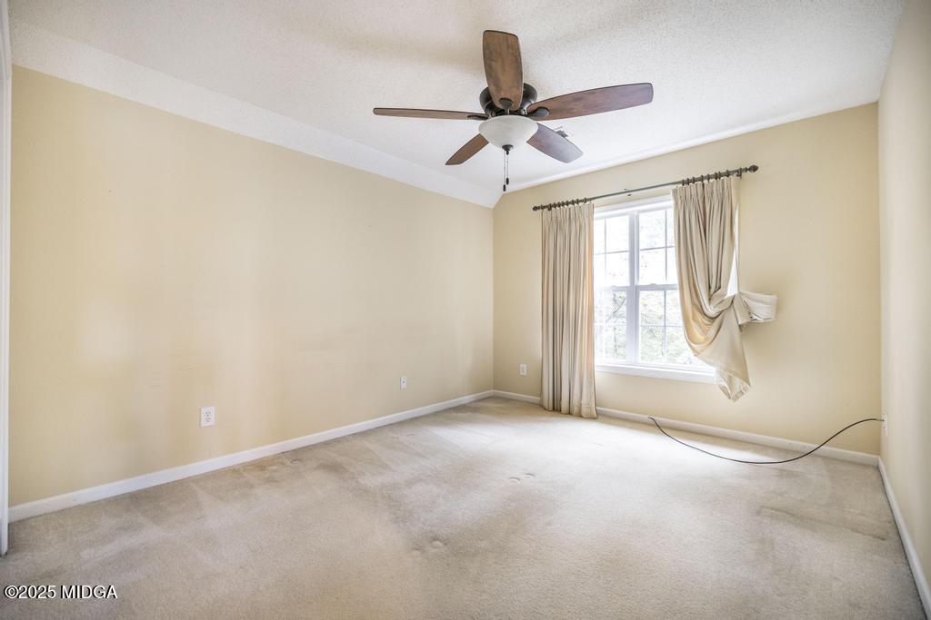 578 Edgefield Way Macon, GA 31210 - Photo 15 of 42 a view of room with window and ceiling fan