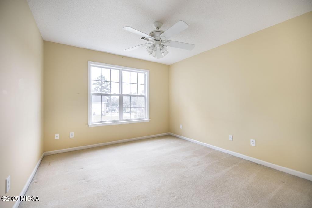 578 Edgefield Way Macon, GA 31210 - Photo 17 of 42 a view of an empty room with a window