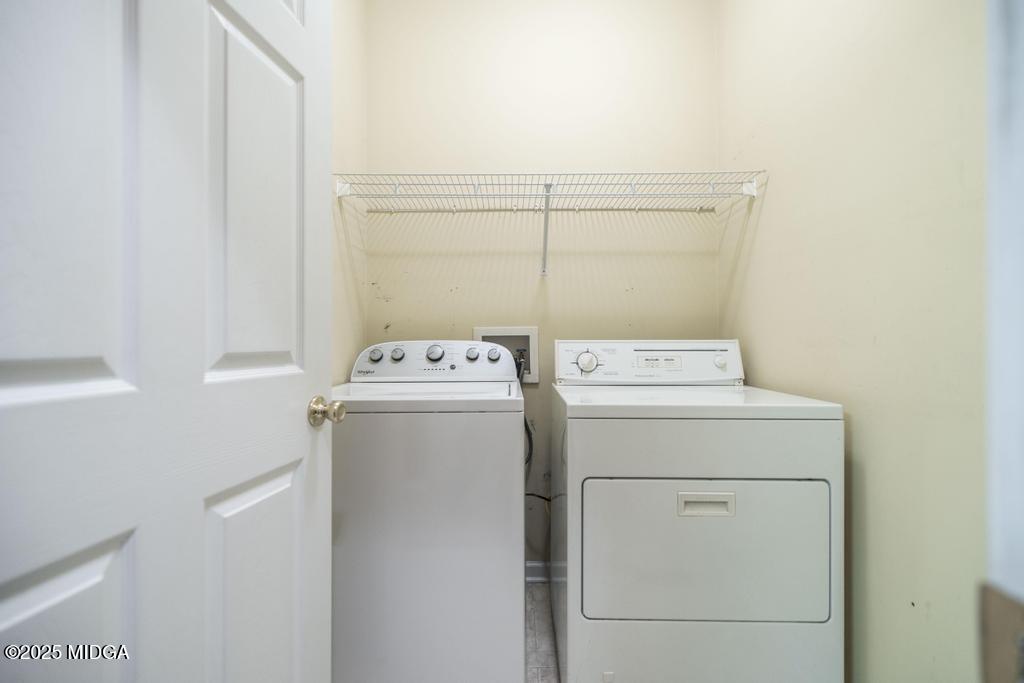 578 Edgefield Way Macon, GA 31210 - Photo 27 of 42 a utility room with dryer and washer