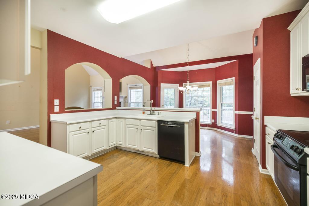 578 Edgefield Way Macon, GA 31210 - Photo 29 of 42 a kitchen with stainless steel appliances granite countertop a stove and a sink