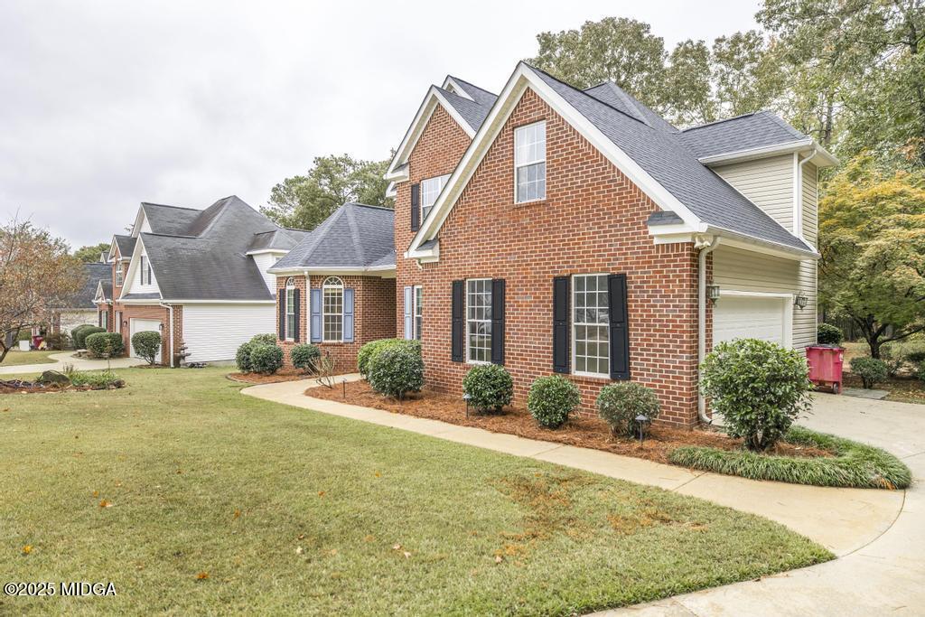 578 Edgefield Way Macon, GA 31210 - Photo 3 of 42 front view of a house with a yard