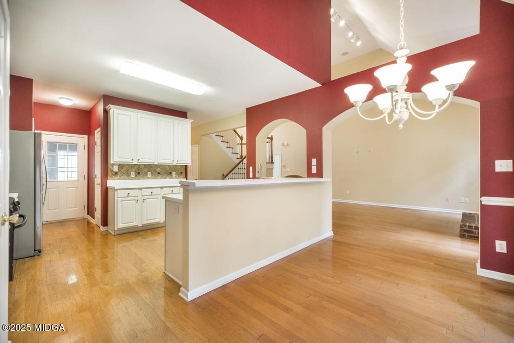 578 Edgefield Way Macon, GA 31210 - Photo 34 of 42 a view of a kitchen with a sink and a refrigerator