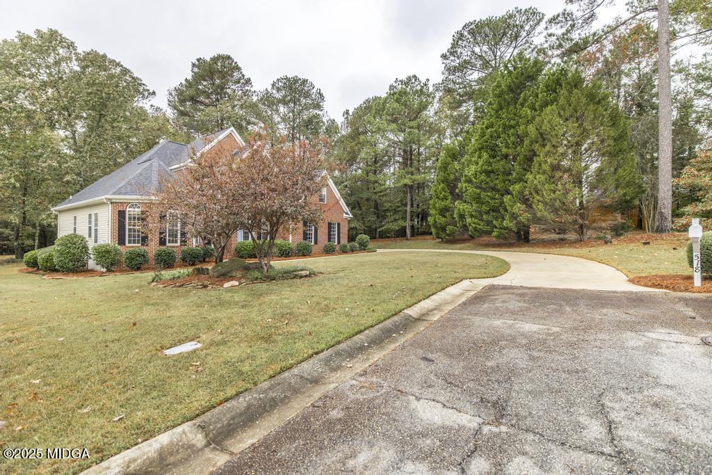 578 Edgefield Way Macon, GA 31210 - Photo 6 of 42 a view of a house with yard and tree s
