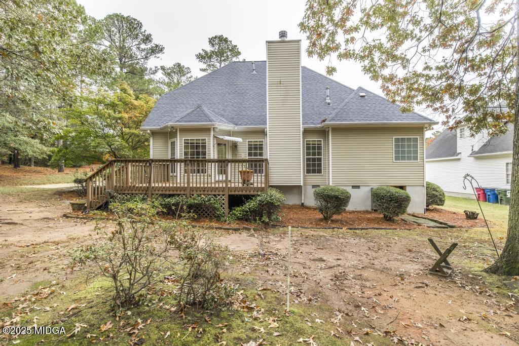 578 Edgefield Way Macon, GA 31210 - Photo 9 of 42 a backyard of a house with seating space