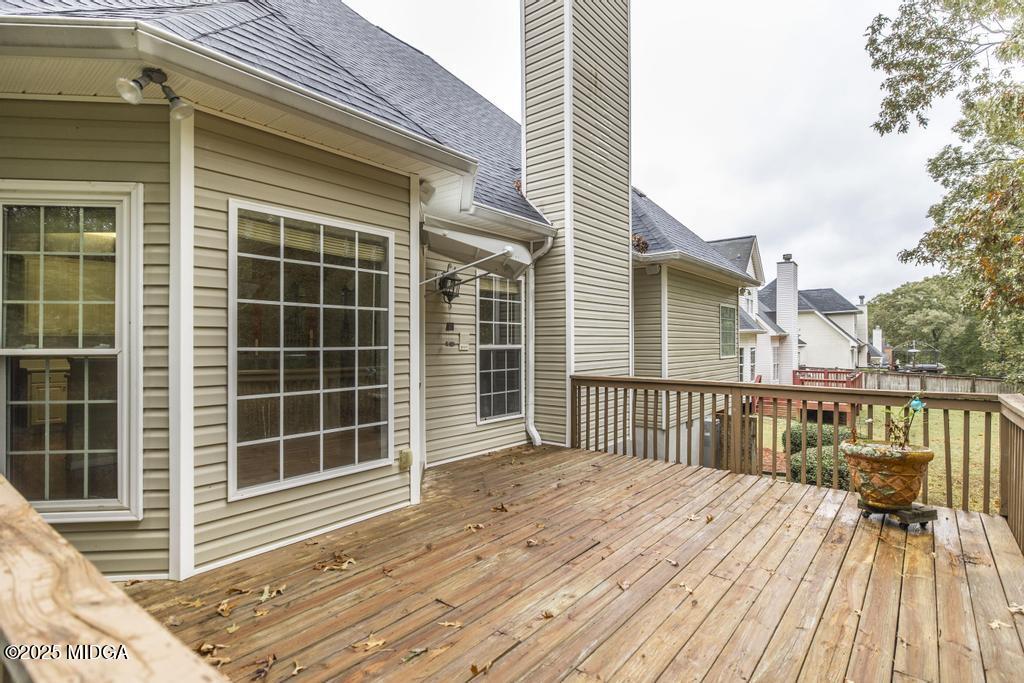 578 Edgefield Way Macon, GA 31210 - Photo 10 of 42 a view of a house with a wooden deck