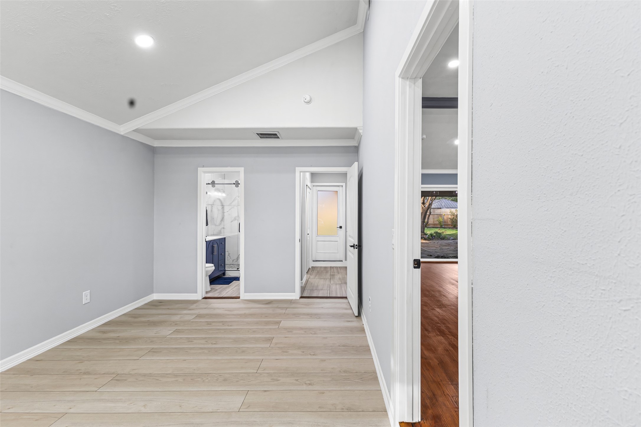 5402 Libbey Drive Houston, TX 77092 - Photo 16 of 43 a view of a hallway with wooden floor and closet