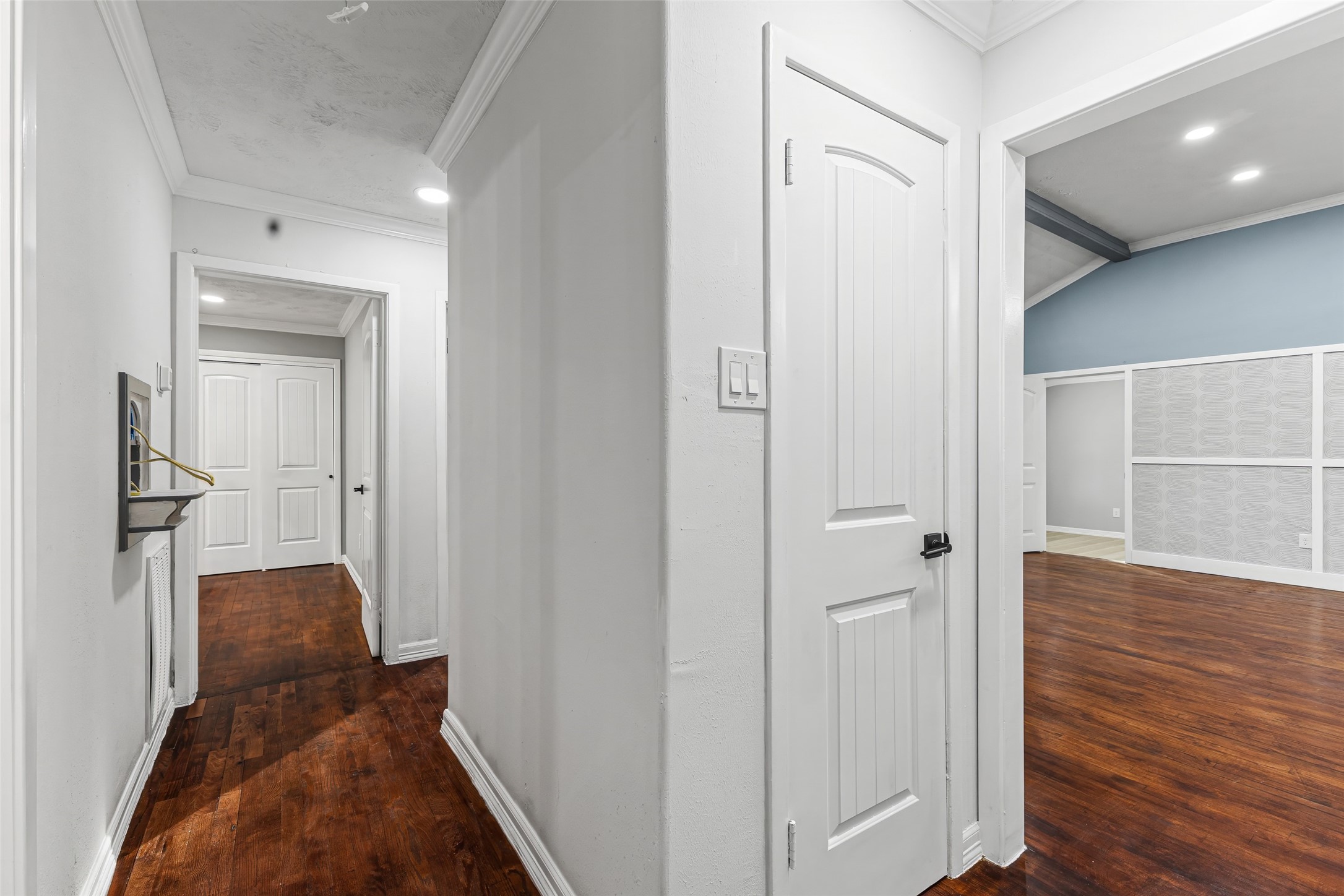 5402 Libbey Drive Houston, TX 77092 - Photo 20 of 43 a view of a hallway with wooden floor and staircase
