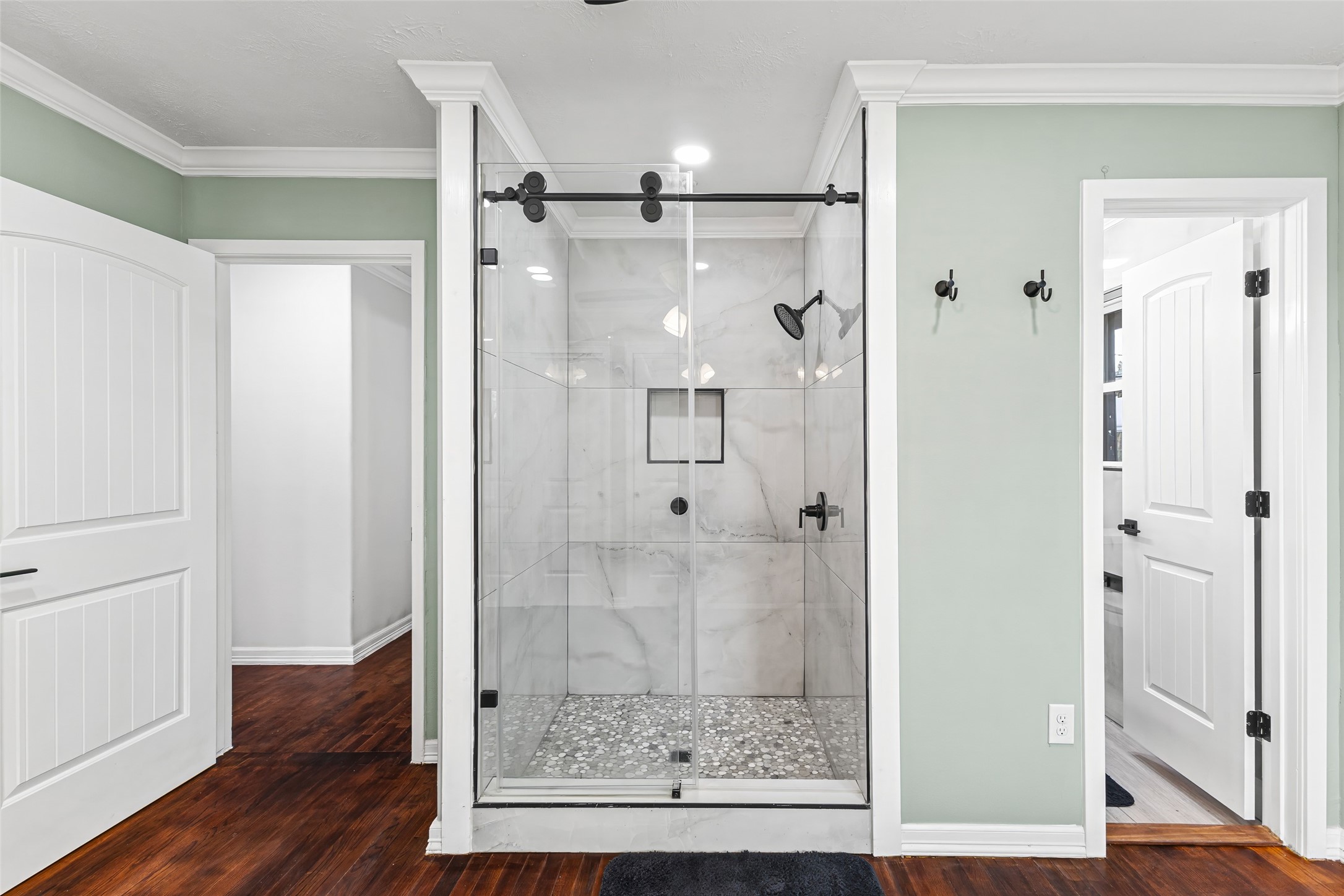 5402 Libbey Drive Houston, TX 77092 - Photo 27 of 43 a bathroom with a glass shower door