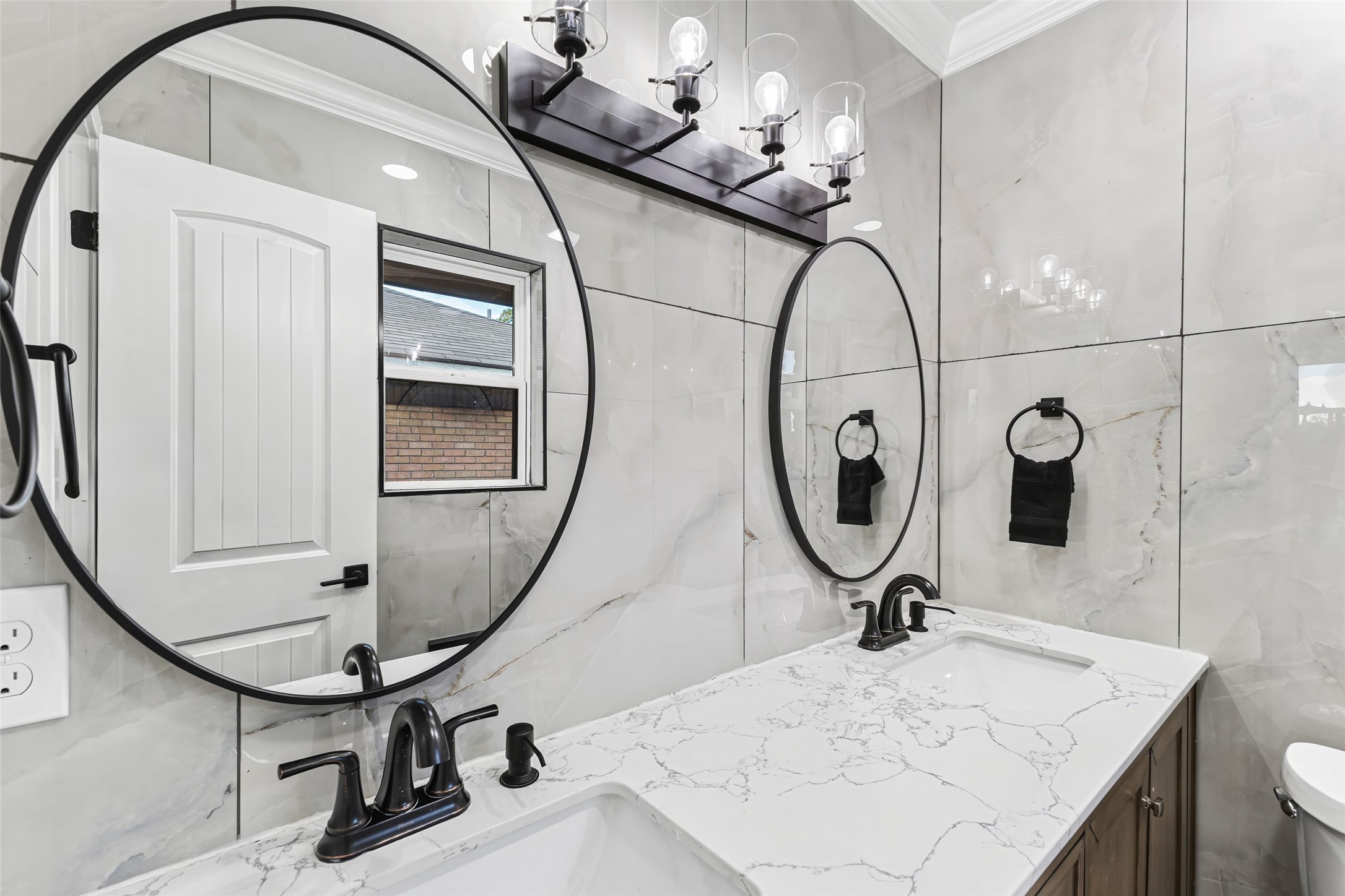 5402 Libbey Drive Houston, TX 77092 - Photo 30 of 43 a bathroom with a sink a mirror and vanity