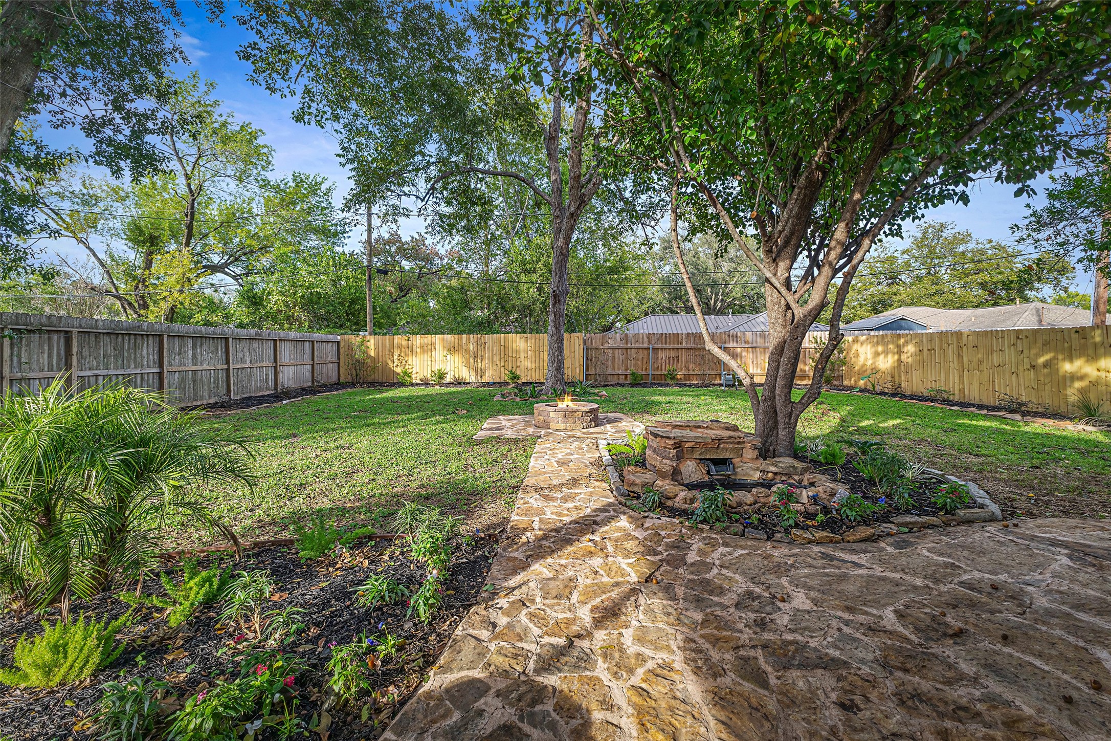 5402 Libbey Drive Houston, TX 77092 - Photo 34 of 43 a view of a backyard with a garden