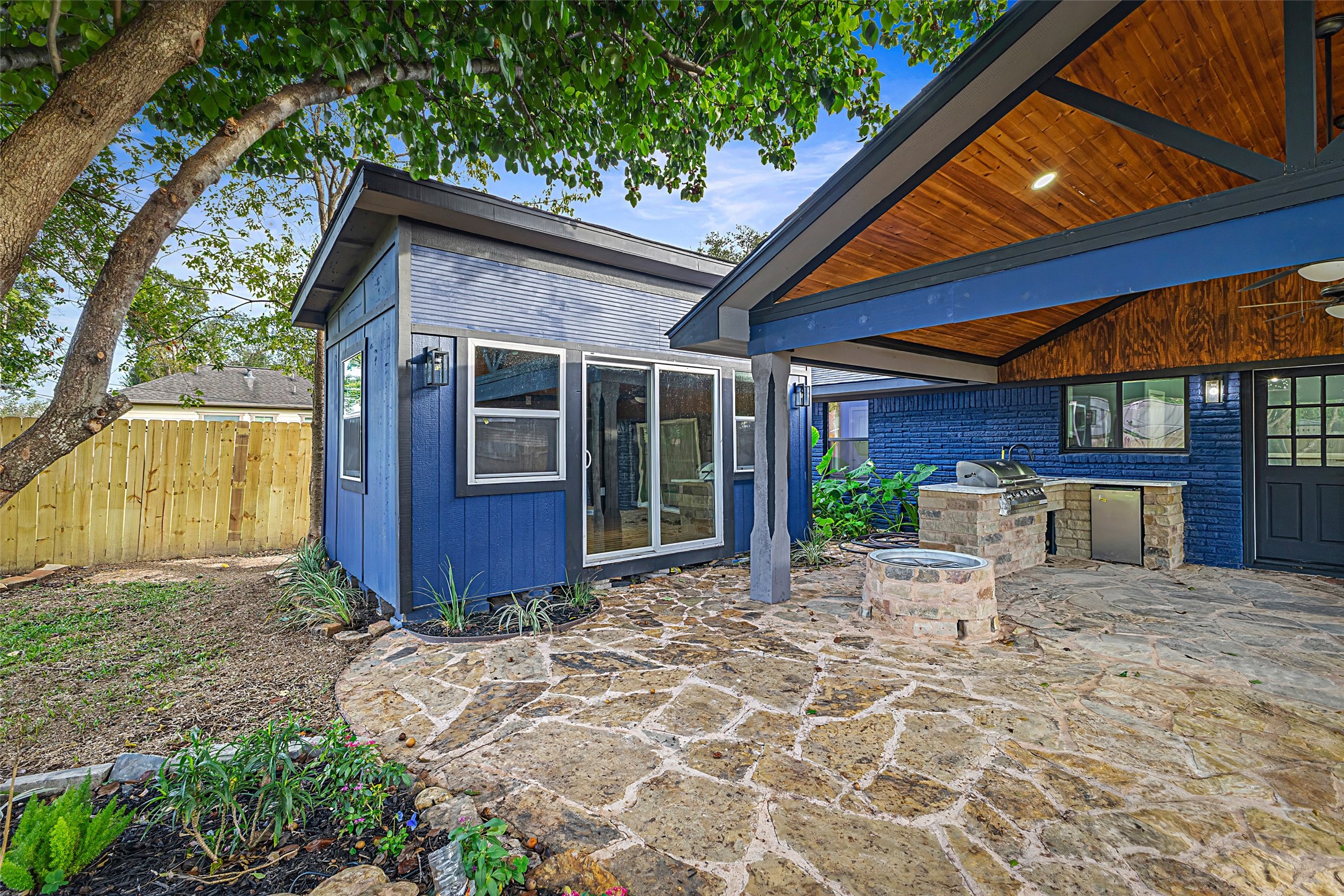 5402 Libbey Drive Houston, TX 77092 - Photo 35 of 43 a view of a house with backyard and sitting area