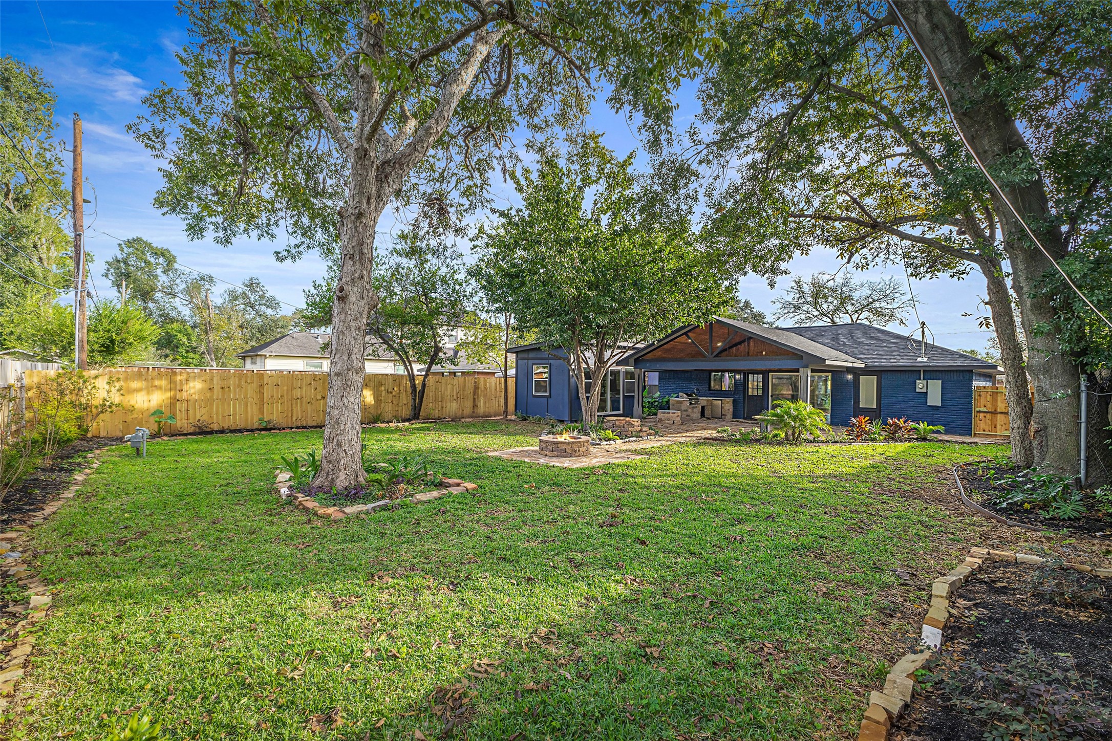 5402 Libbey Drive Houston, TX 77092 - Photo 38 of 43 a front view of a house with garden