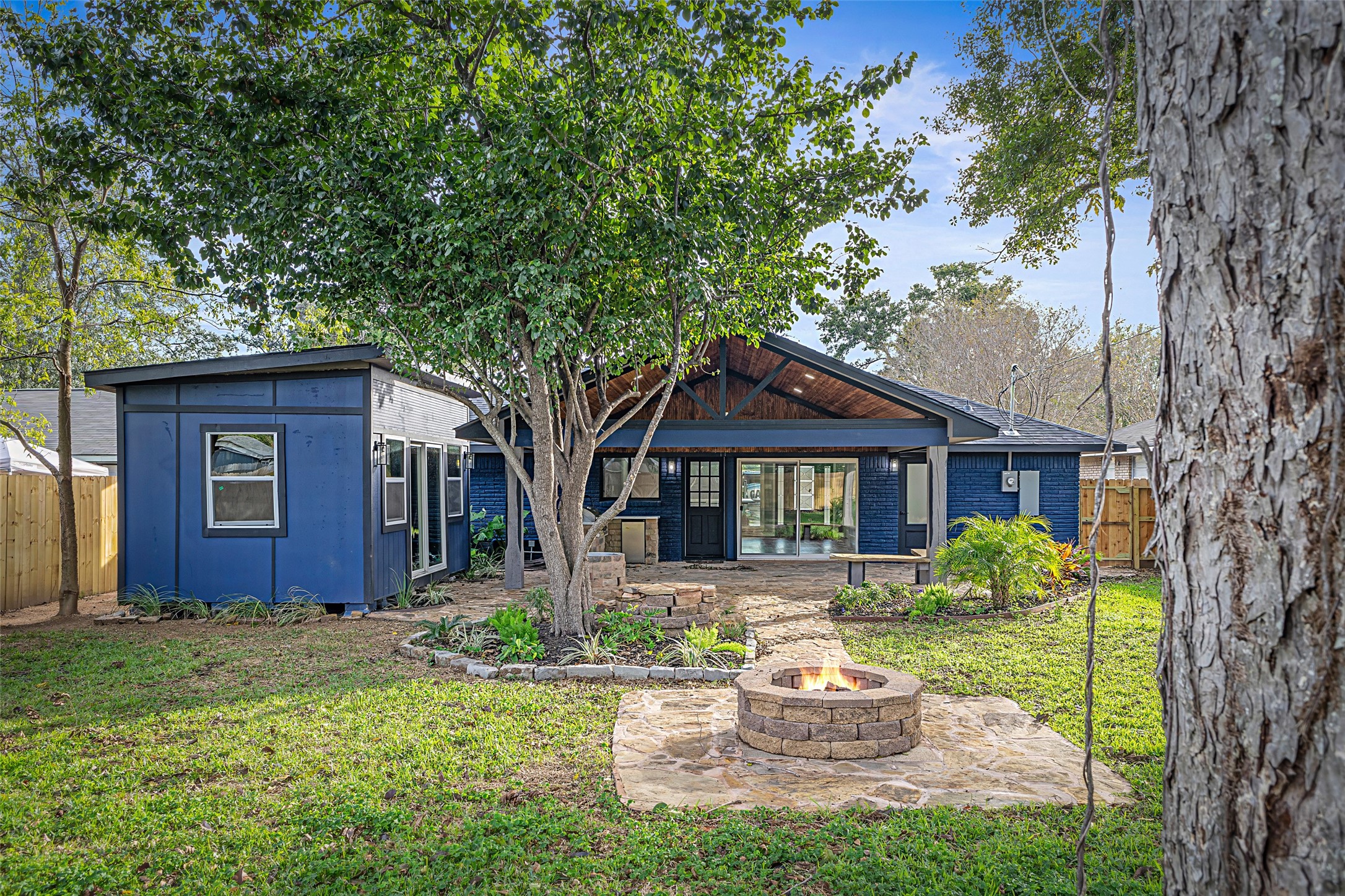 5402 Libbey Drive Houston, TX 77092 - Photo 40 of 43 a front view of a house with garden
