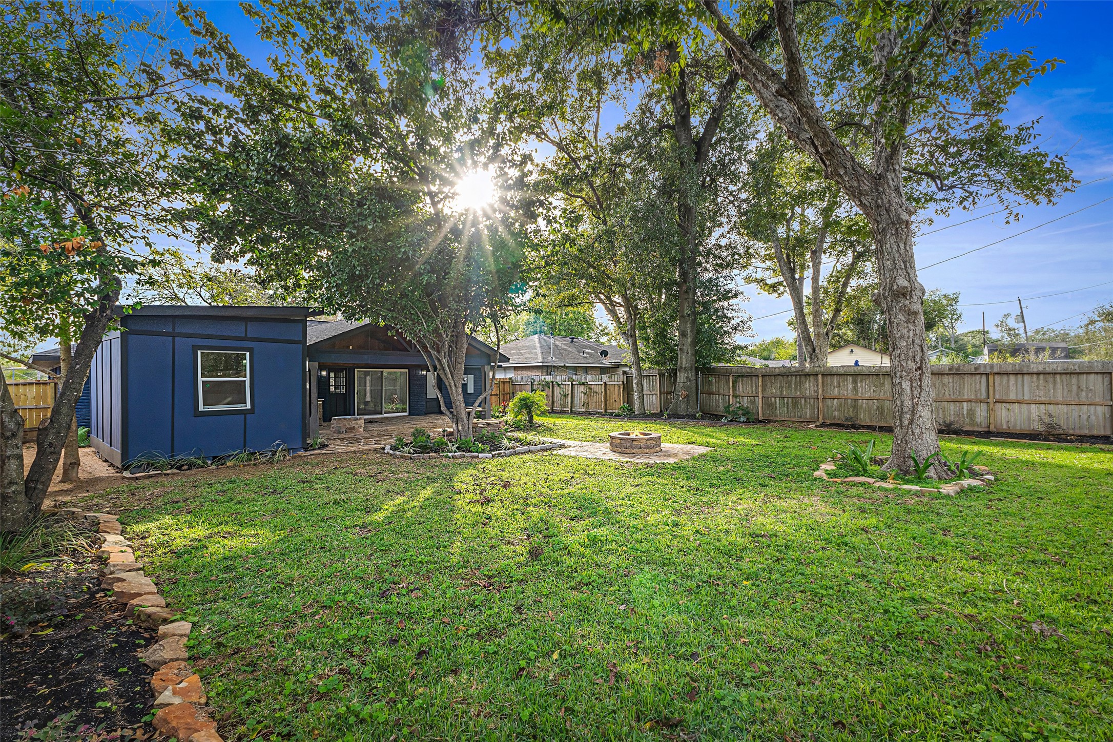 5402 Libbey Drive Houston, TX 77092 - Photo 41 of 43 a view of a house with backyard and a tree