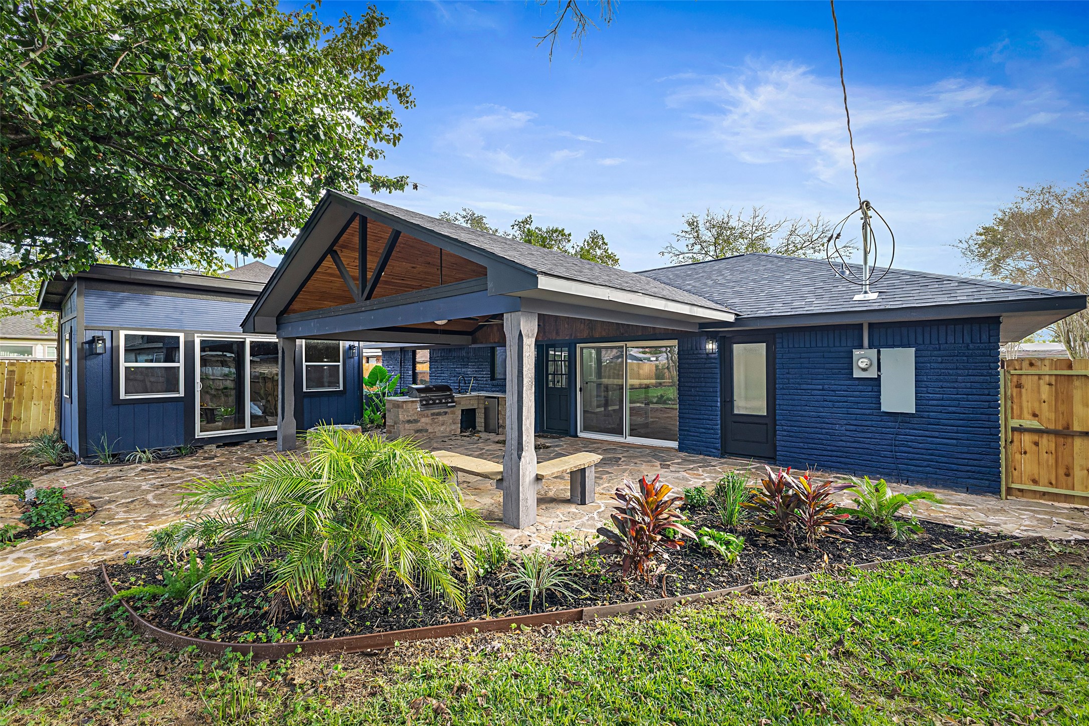 5402 Libbey Drive Houston, TX 77092 - Photo 43 of 43 a front view of a house with garden