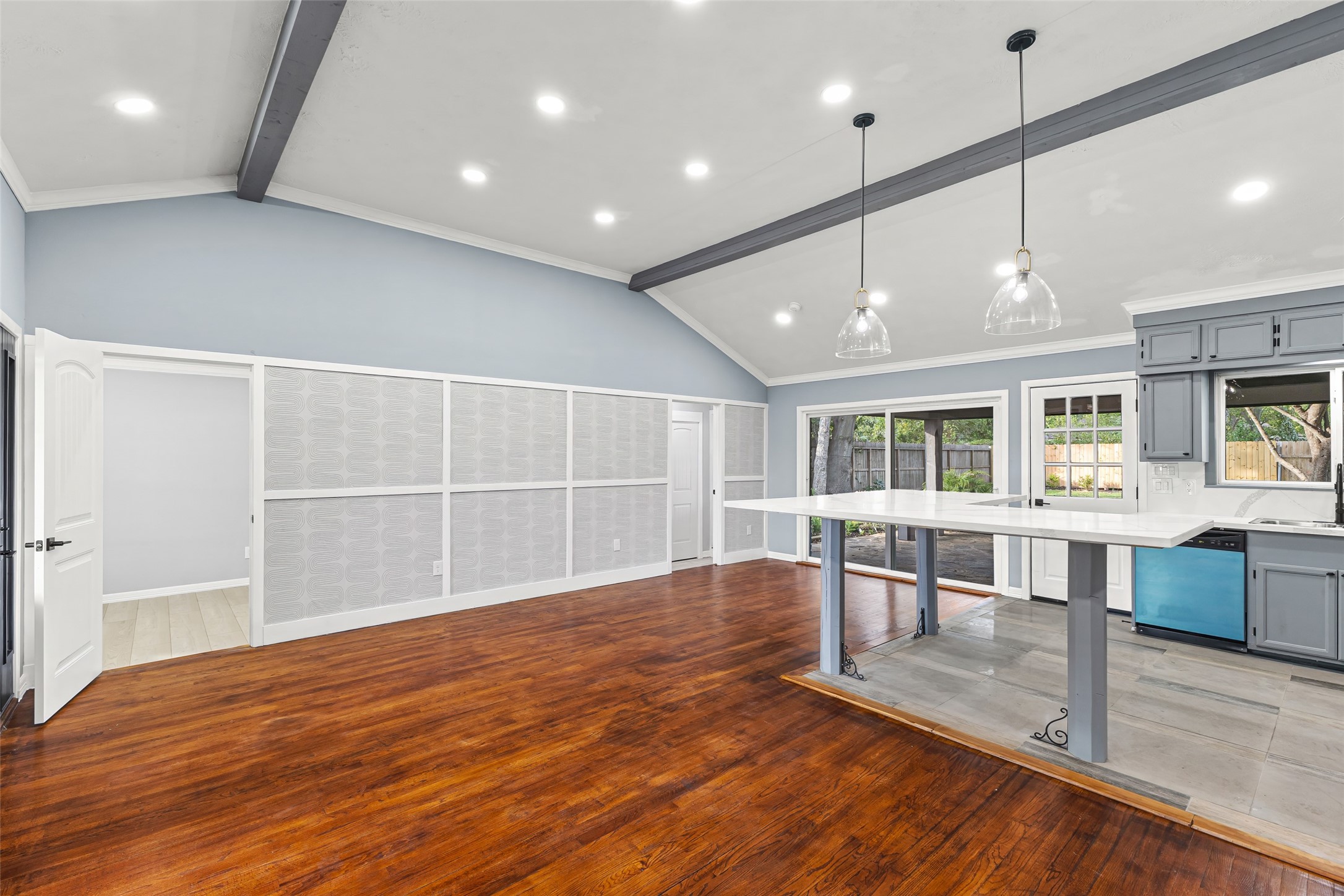 5402 Libbey Drive Houston, TX 77092 - Photo 6 of 43 a view of empty room with wooden floor and large window
