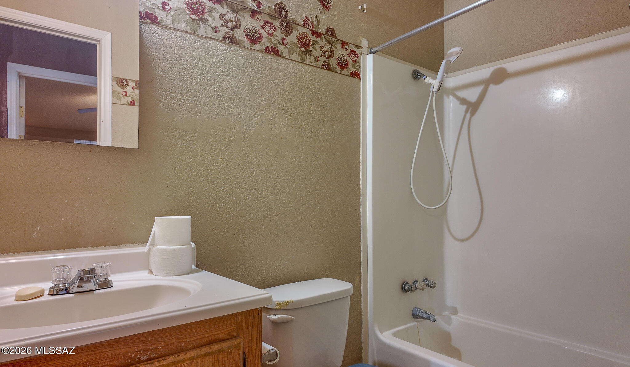 27651 South Canoa Road Amado, AZ 85645 - Photo 14 of 20 a bathroom with a sink a toilet and shower