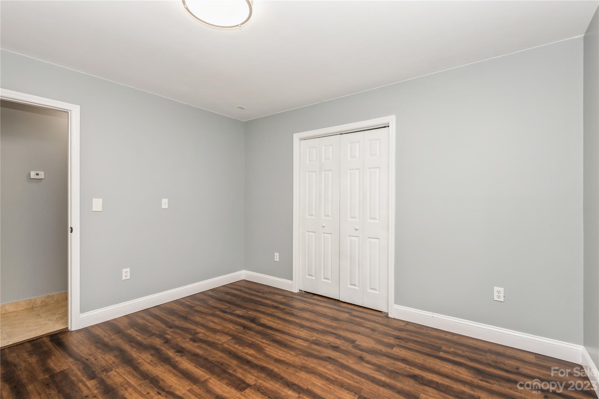125 Rhyne Station Road Charlotte, NC 28214 - Photo 13 of 26 a view of room with wooden floor