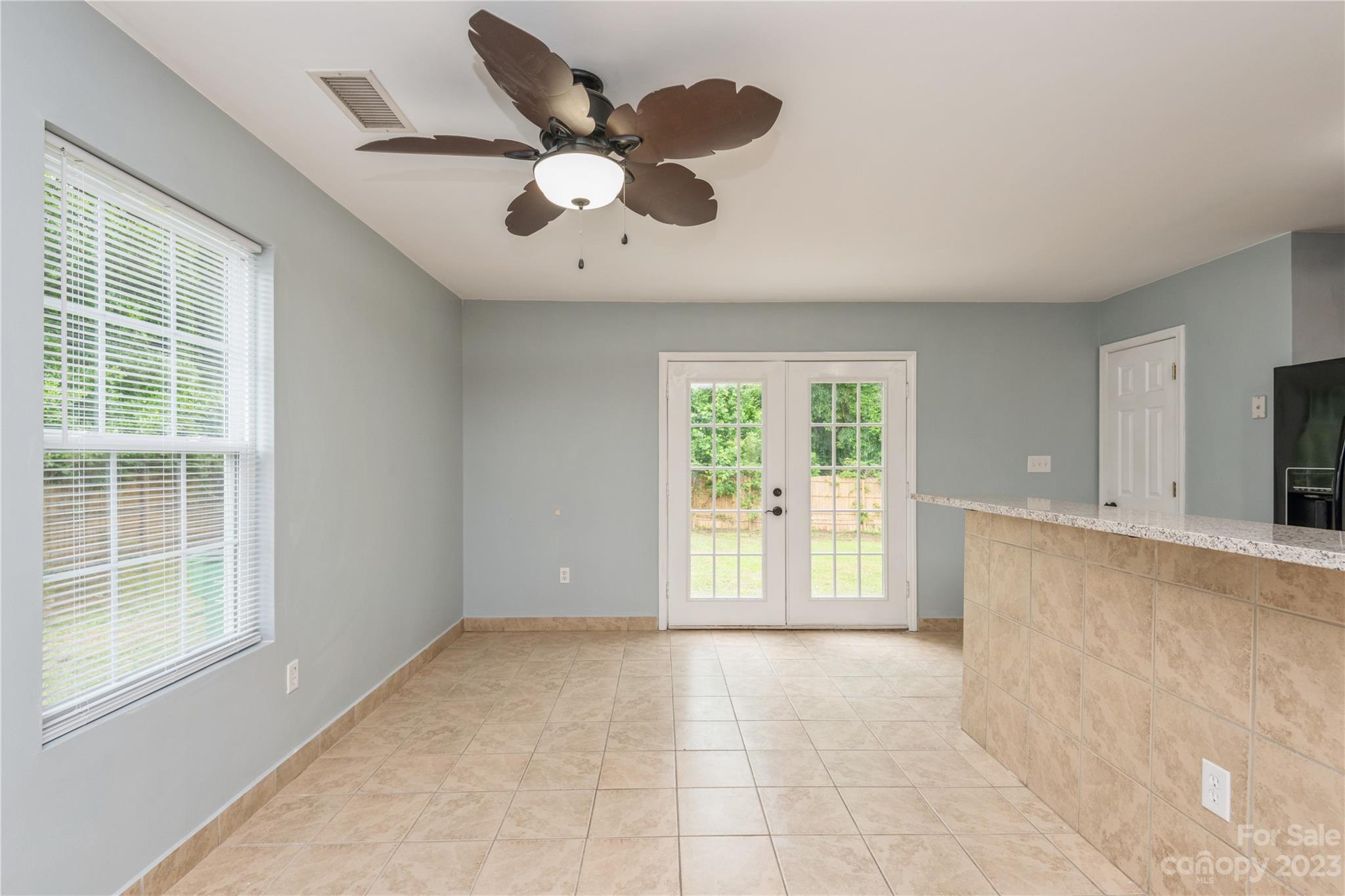 125 Rhyne Station Road Charlotte, NC 28214 - Photo 5 of 26 a view of an empty room with a window