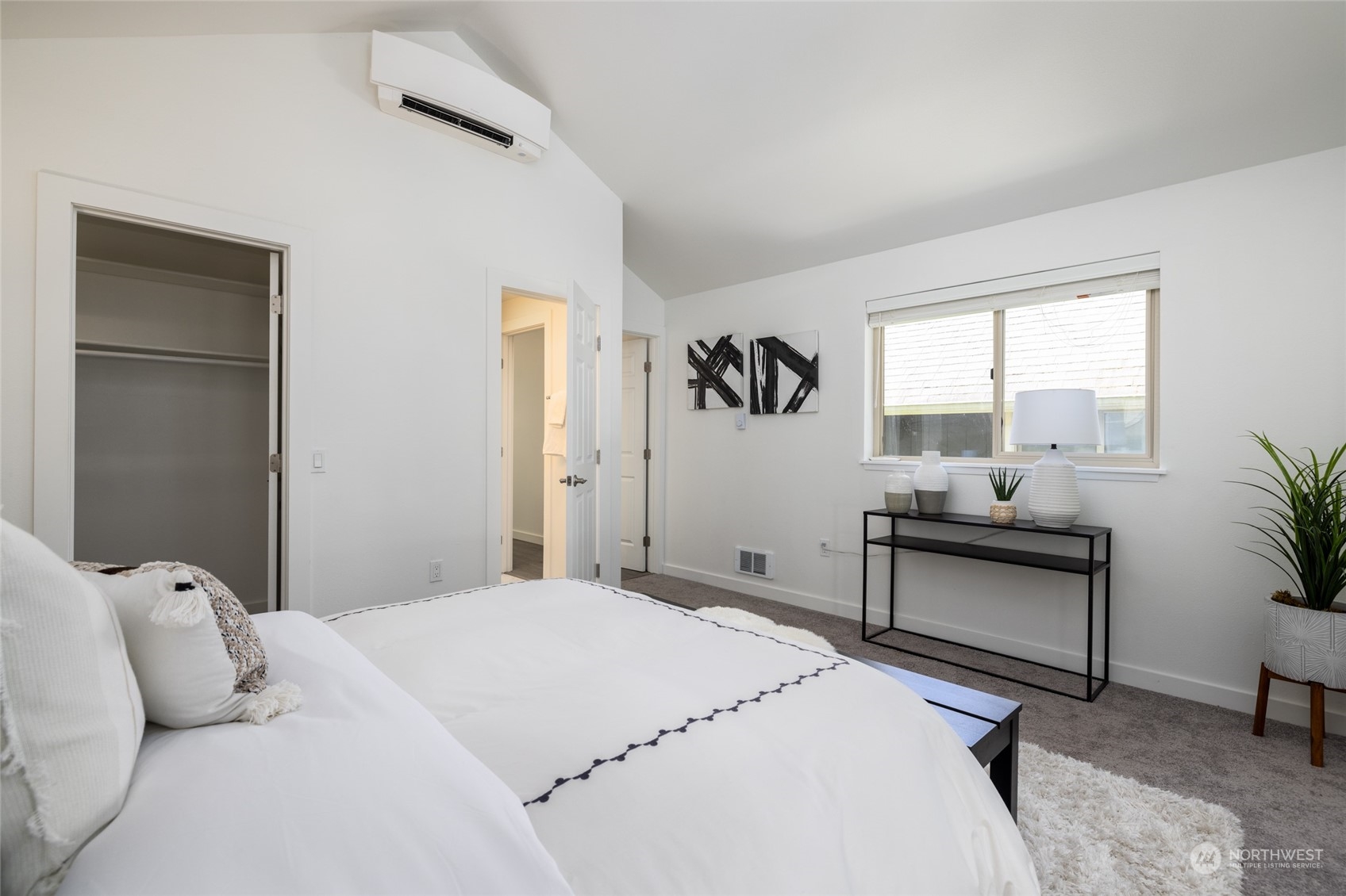 2131 North 88th Street Seattle, WA 98103 - Photo 12 of 28 a bedroom with a bed and a couch