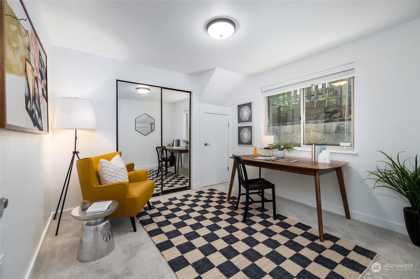 2131 North 88th Street Seattle, WA 98103 - Photo 19 of 28 a living room with furniture and a potted plant