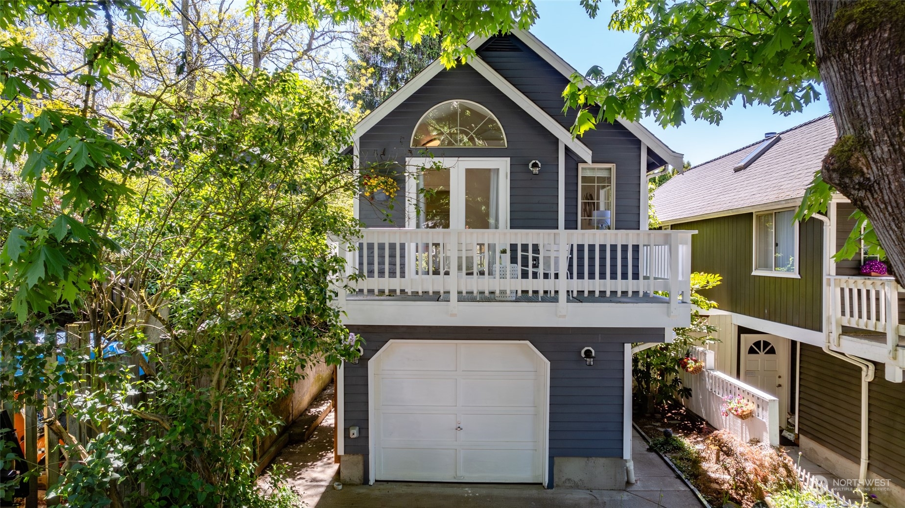 2131 North 88th Street Seattle, WA 98103 - Photo 2 of 28 a front view of a house with garden