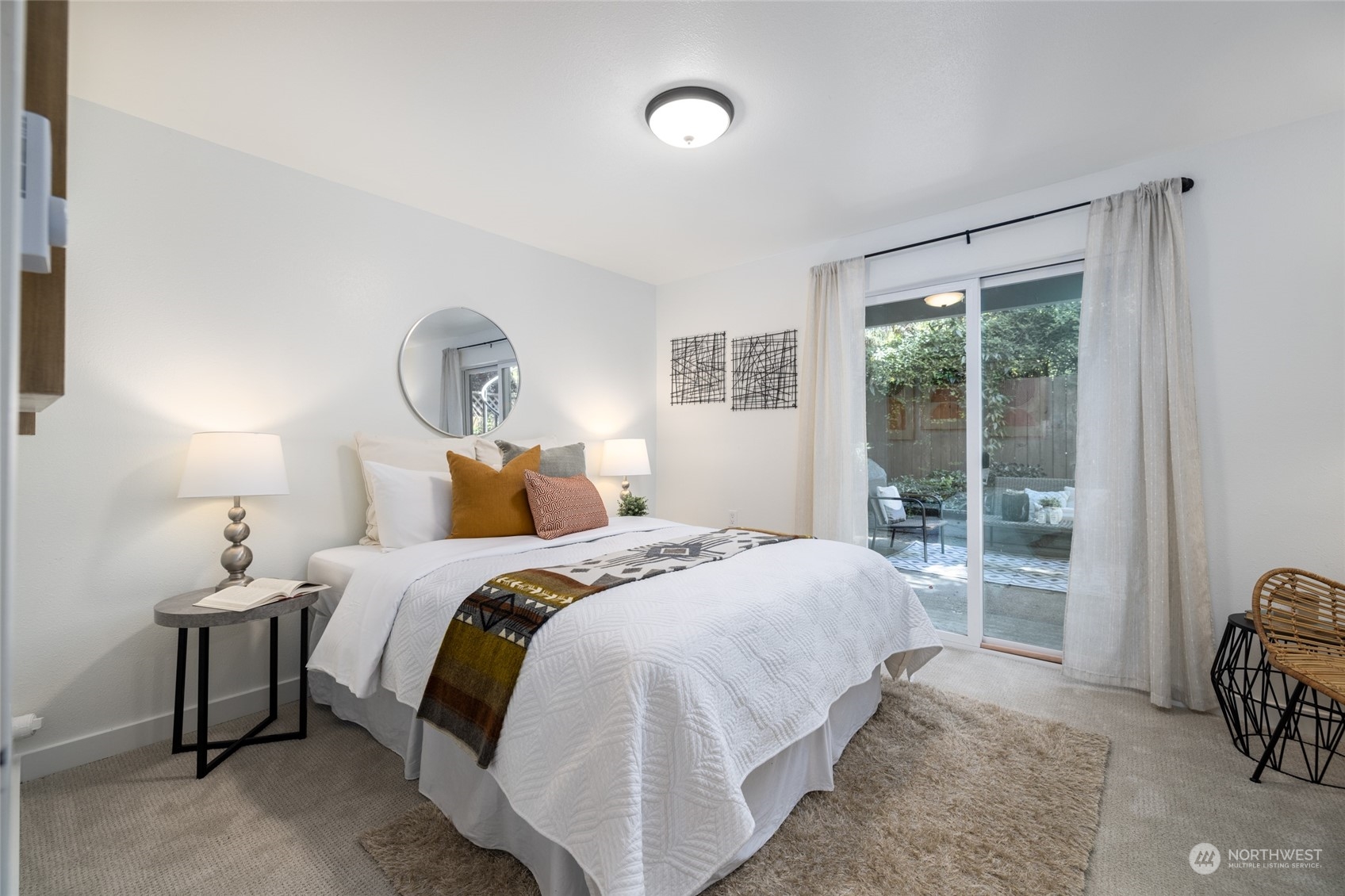 2131 North 88th Street Seattle, WA 98103 - Photo 21 of 28 a bedroom with a bed and a window