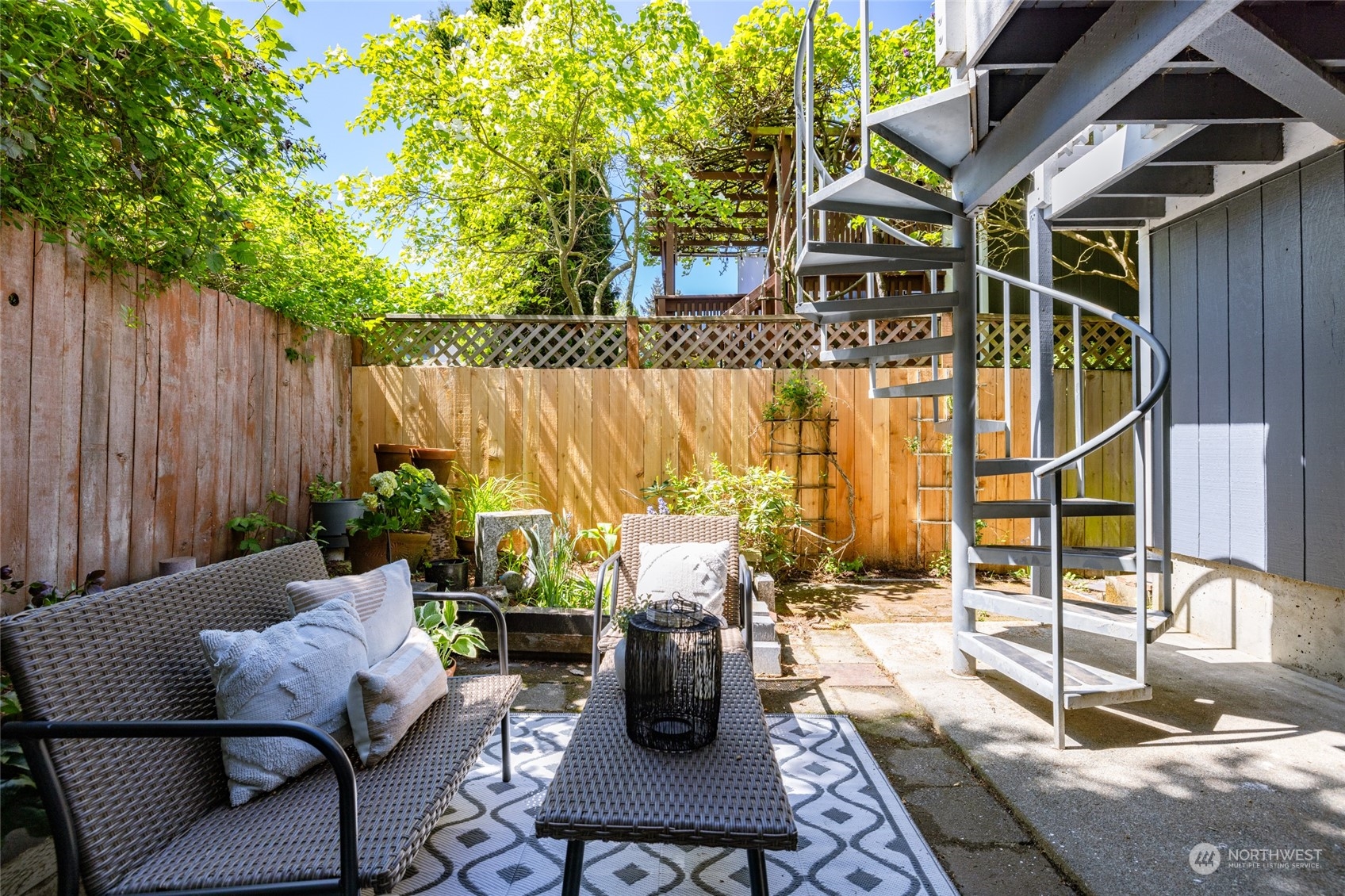 2131 North 88th Street Seattle, WA 98103 - Photo 24 of 28 a view of a chairs and table in the patio
