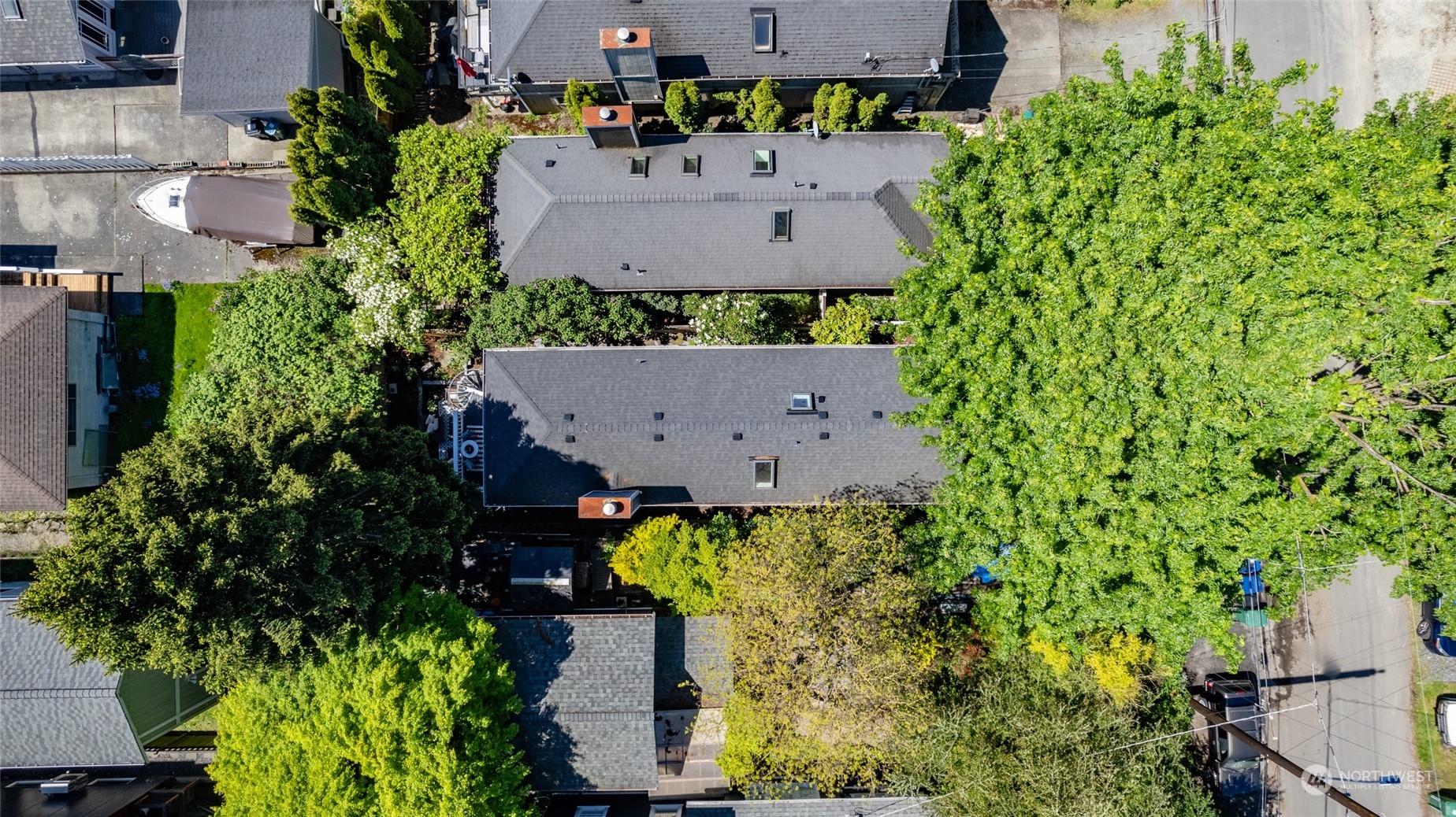2131 North 88th Street Seattle, WA 98103 - Photo 27 of 28 an aerial view of a house with a garden