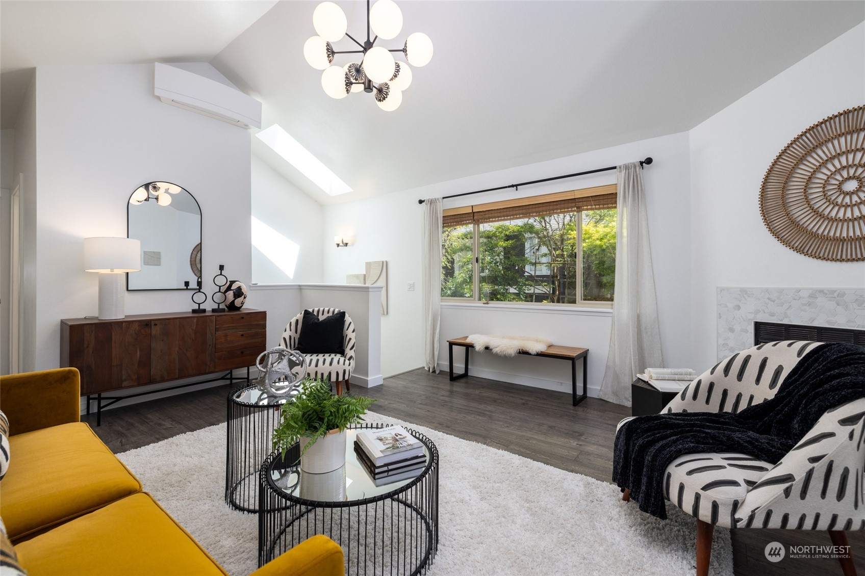 2131 North 88th Street Seattle, WA 98103 - Photo 5 of 28 a living room with furniture a fireplace and a large window