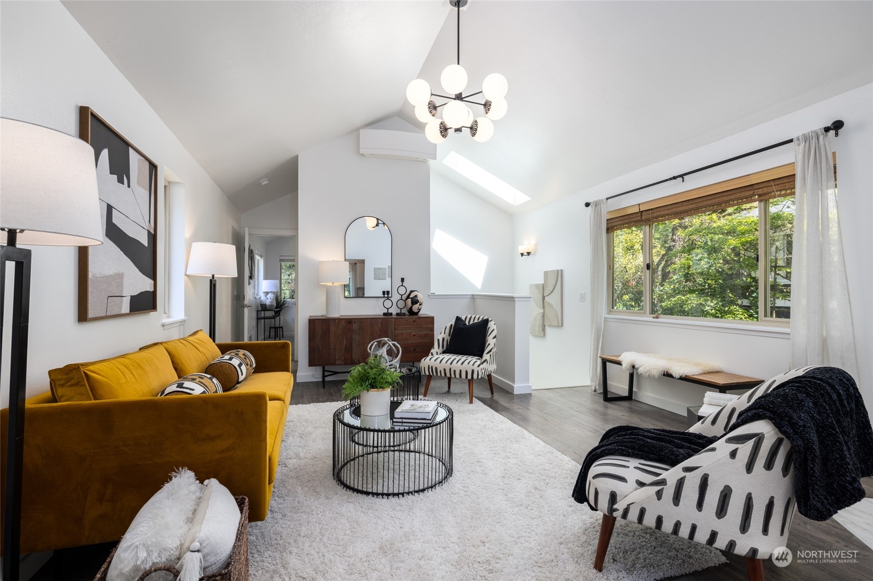 2131 North 88th Street Seattle, WA 98103 - Photo 6 of 28 a living room with furniture and a large window