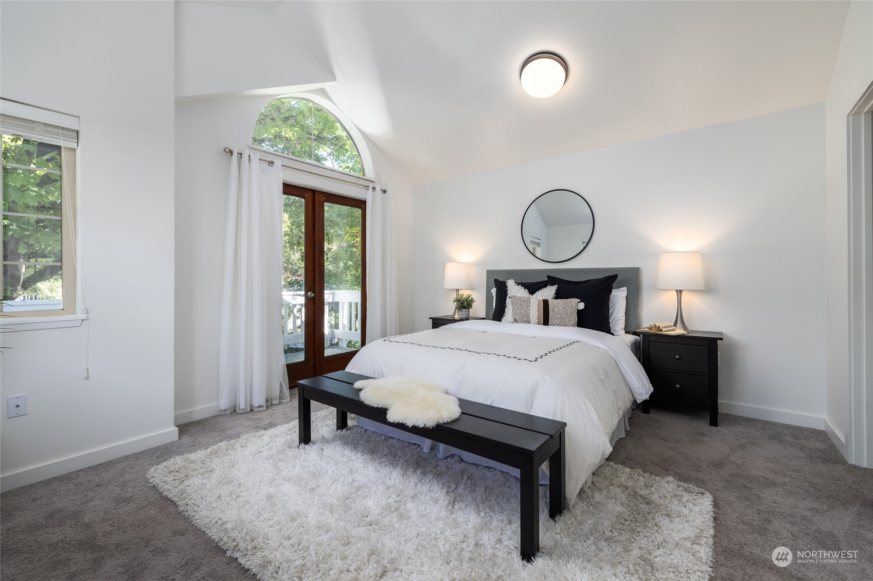 2131 North 88th Street Seattle, WA 98103 - Photo 7 of 28 a bedroom with a bed and window