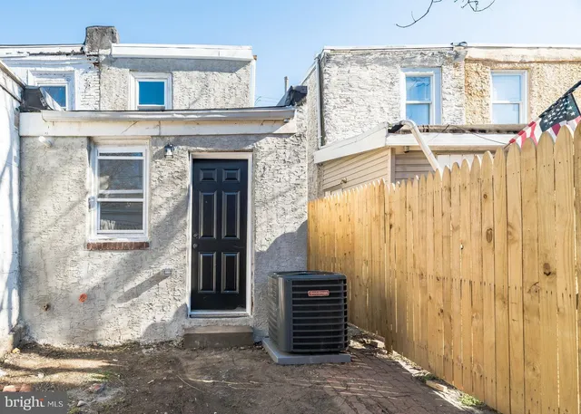 a front view of a house with a garage