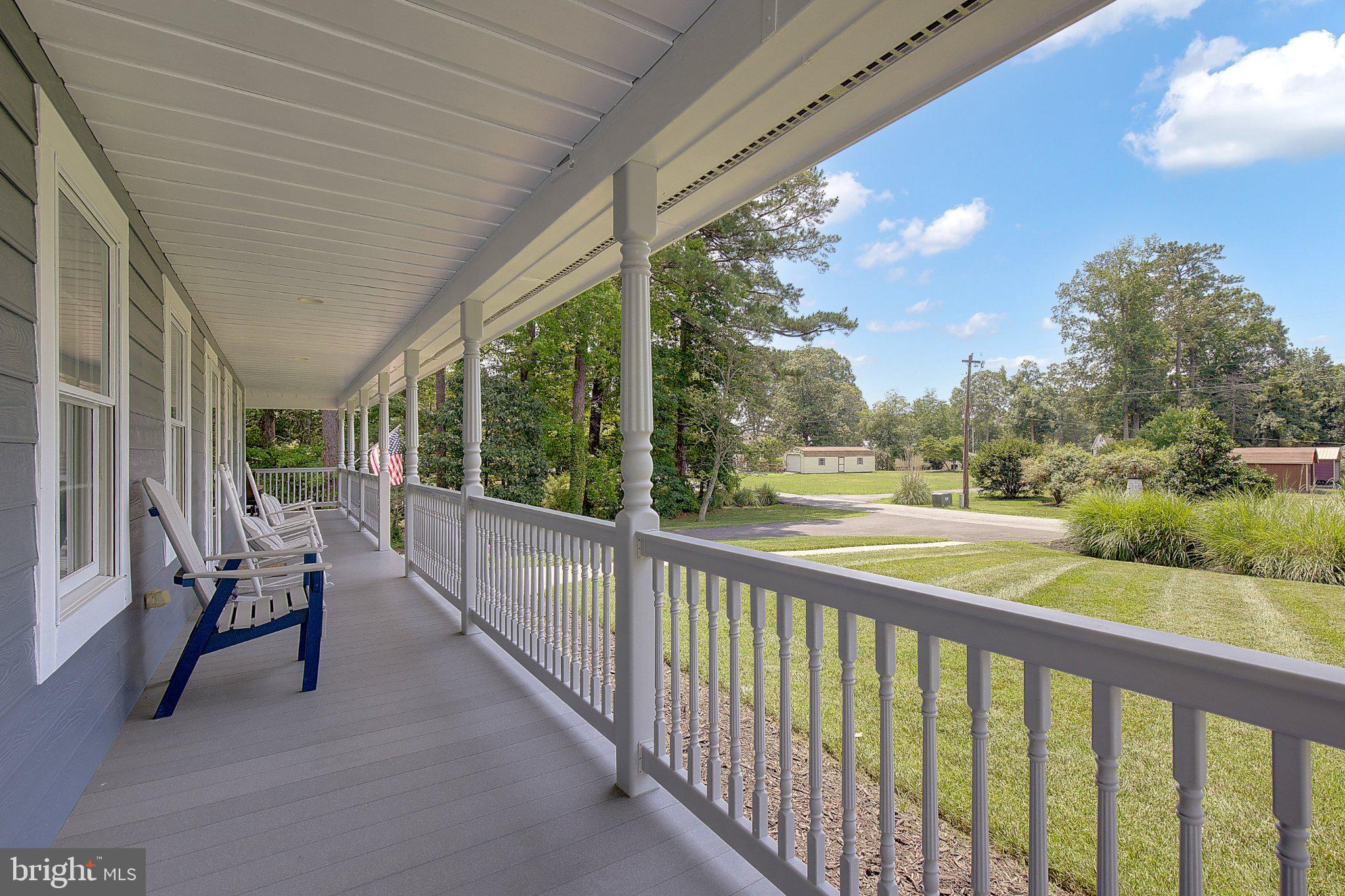 980 Apple Lane Solomons, MD 20629 - Photo 51 of 82 Charming porch with serene views.