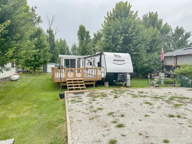 a house with trees in the background